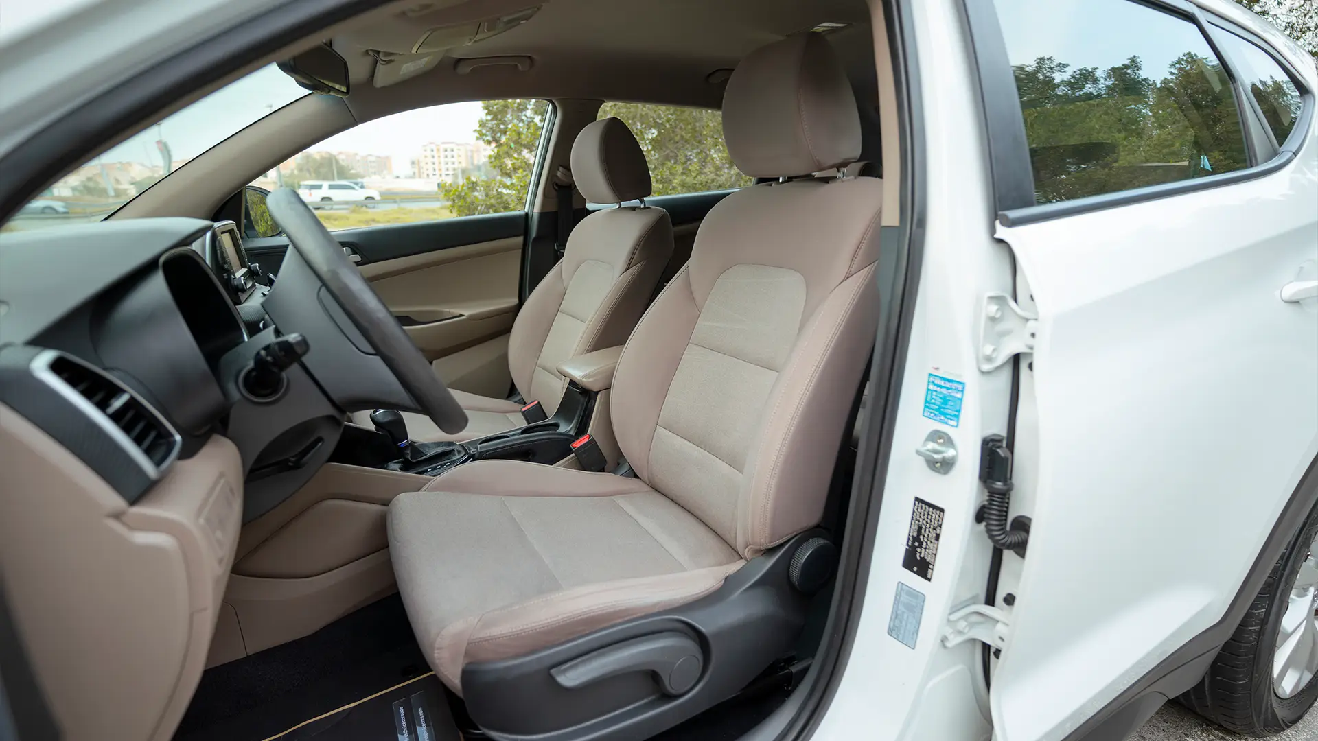 Used 2020 Hyundai Tucson GDI in White – Front Driver Side Cabin View for Sale at First Choice Cars Dubai Sharjah