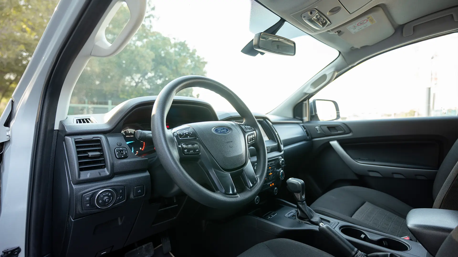 Used 2021 Ford Ranger XL in Silver – Driver Side Dashboard & Steering View for Sale at First Choice Cars Dubai Sharjah