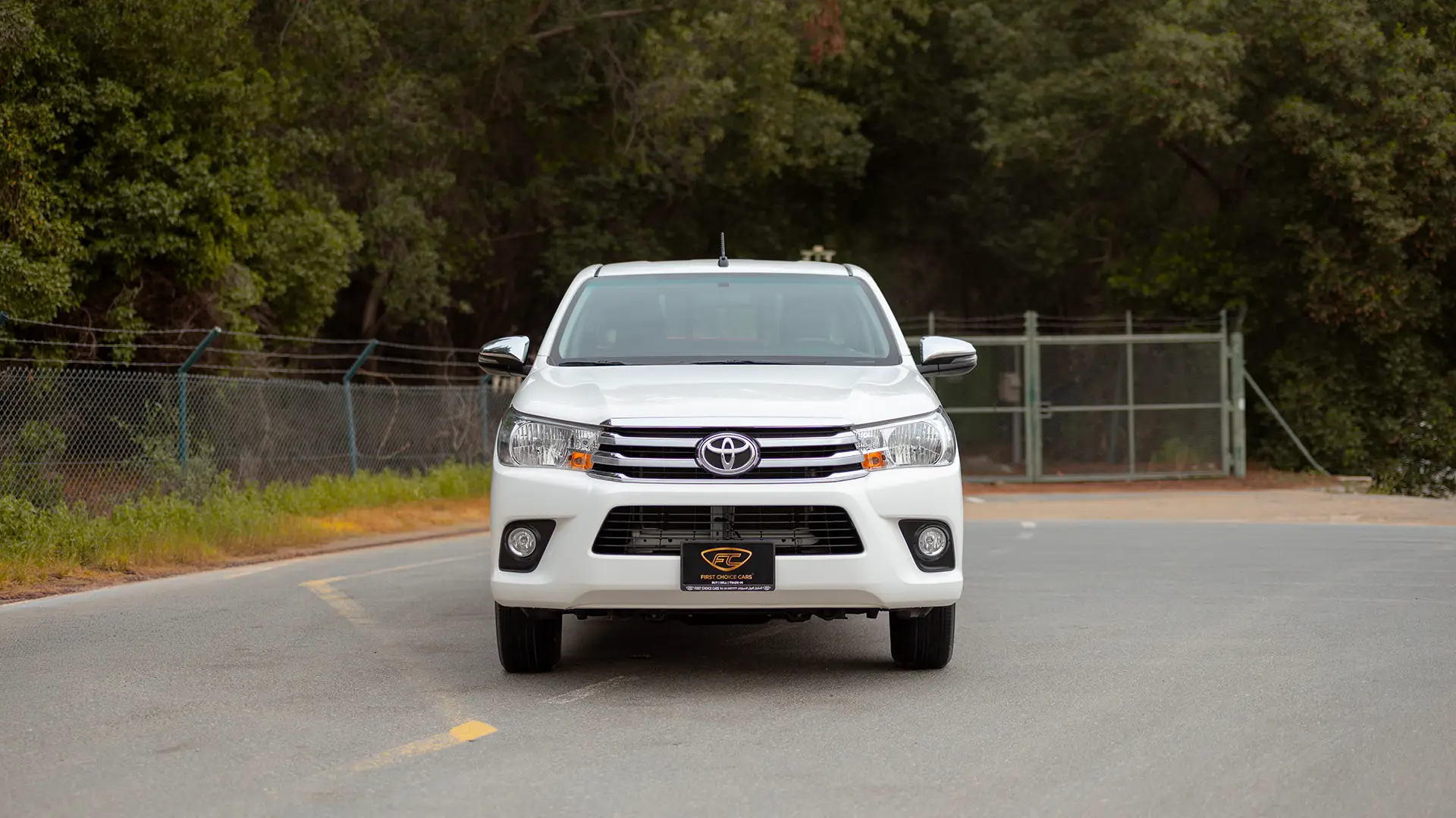 Used 2024 Toyota Hilux GL Double Cabin in White – Front View for Sale at First Choice Cars Dubai Sharjah