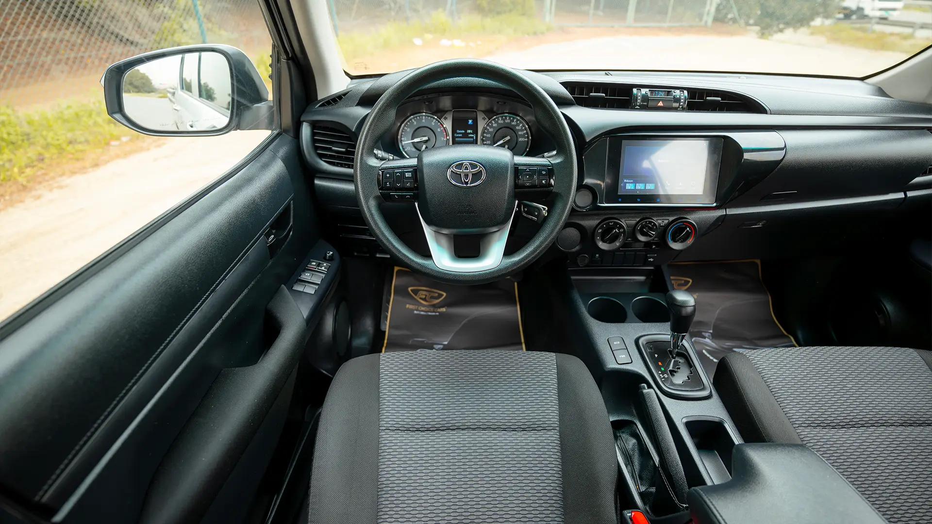 Used 2024 Toyota Hilux GL Double Cabin in White – Steering Wheel & Instrument Cluster for Sale at First Choice Cars Dubai Sharjah