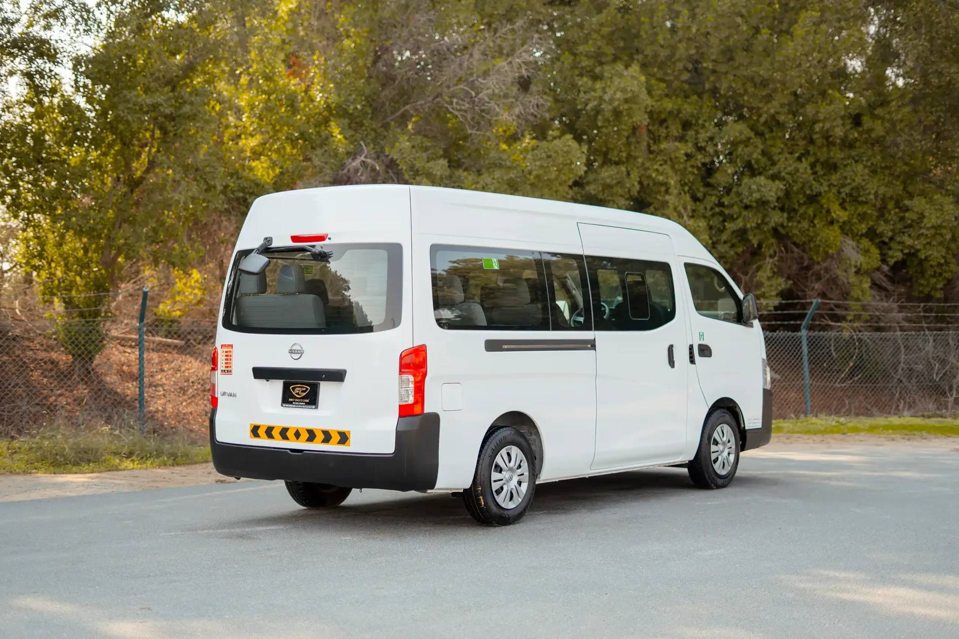 Used 2023 Nissan Urvan High Roof in White – Right Back Diagonal (45°) View for Sale at First Choice Cars Dubai Sharjah
