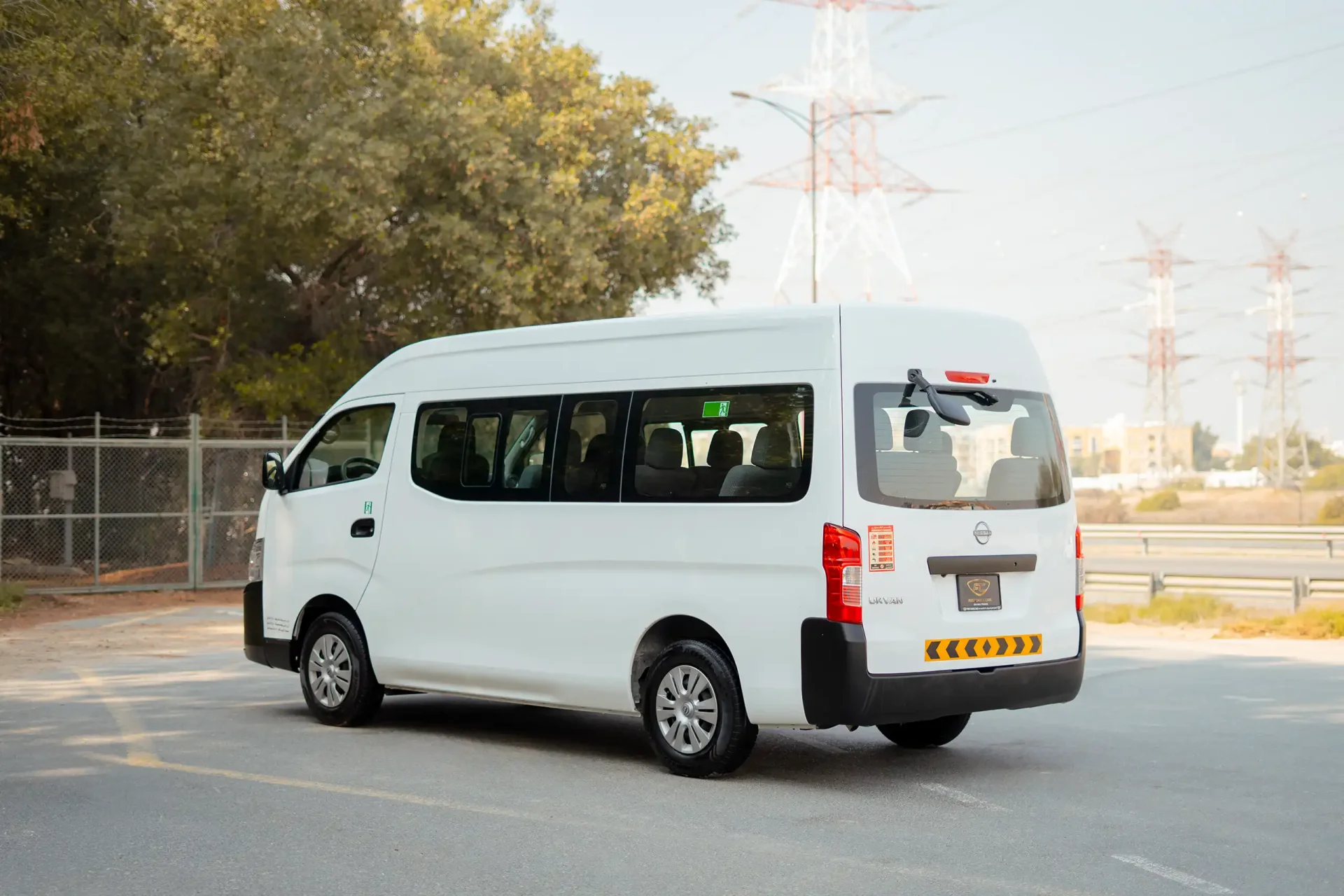 Used 2023 Nissan Urvan High Roof in White – Left Back Diagonal (45°) View for Sale at First Choice Cars Dubai Sharjah