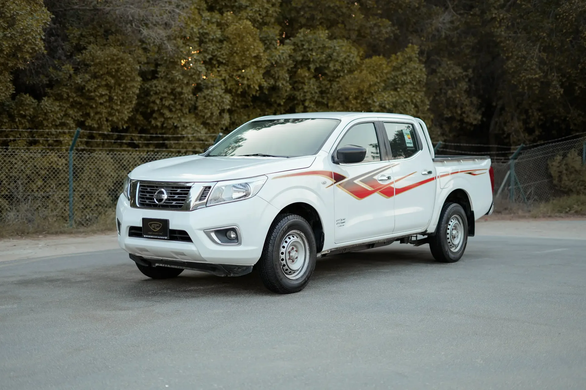 Used 2022 Nissan Navara SE in White – Left Front Diagonal (45°) View for Sale at First Choice Cars Dubai Sharjah