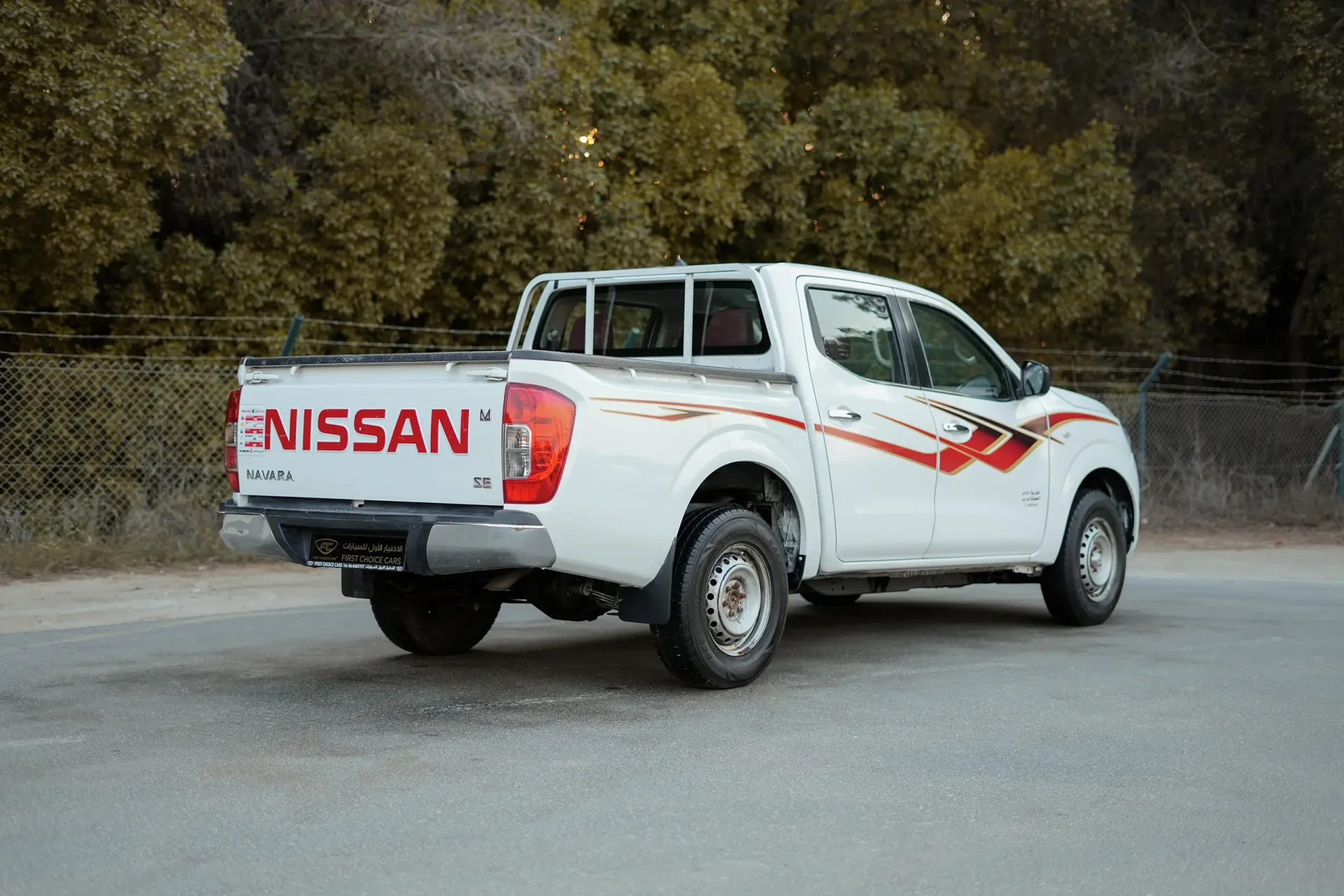 Used 2022 Nissan Navara SE in White – Right Back Diagonal (45°) View for Sale at First Choice Cars Dubai Sharjah