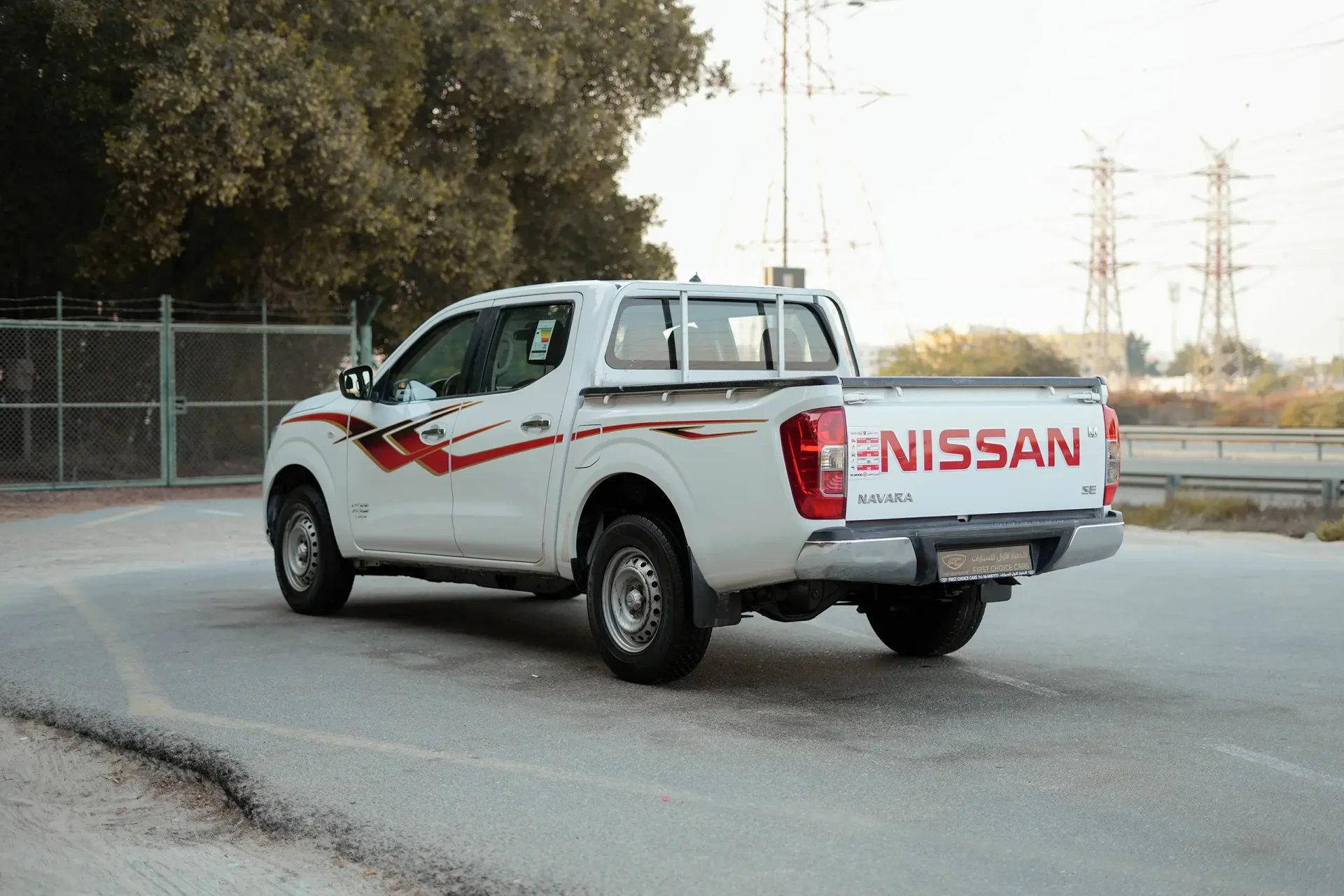 Used 2022 Nissan Navara SE in White – Left Back Diagonal (45°) View for Sale at First Choice Cars Dubai Sharjah