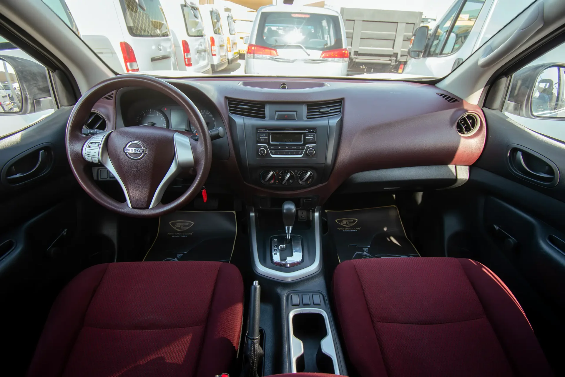 Used 2022 Nissan Navara SE in White – Front Cabin / Dashboard Full View for Sale at First Choice Cars Dubai Sharjah