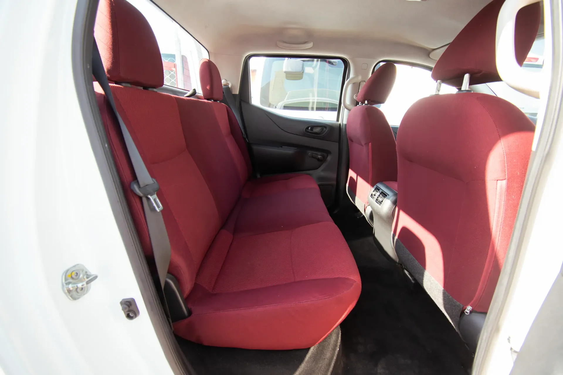 Used 2022 Nissan Navara SE in White – Rear Passenger Side Cabin View for Sale at First Choice Cars Dubai Sharjah