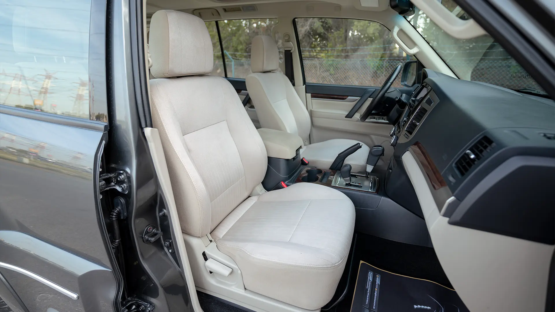 Used 2022 Mitsubishi Pajero 3.0L GLS Midline in Grey – Front Passenger Side Cabin View for Sale at First Choice Cars Dubai Sharjah
