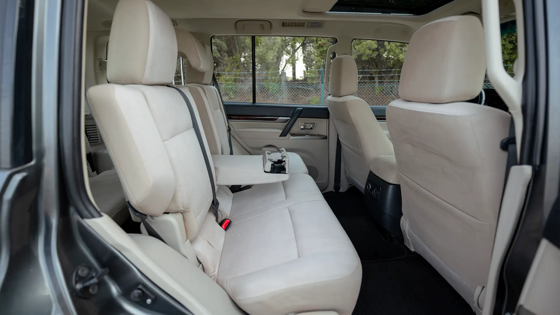 Used 2022 Mitsubishi Pajero GLS Midline in Grey – Rear Passenger Side Cabin View