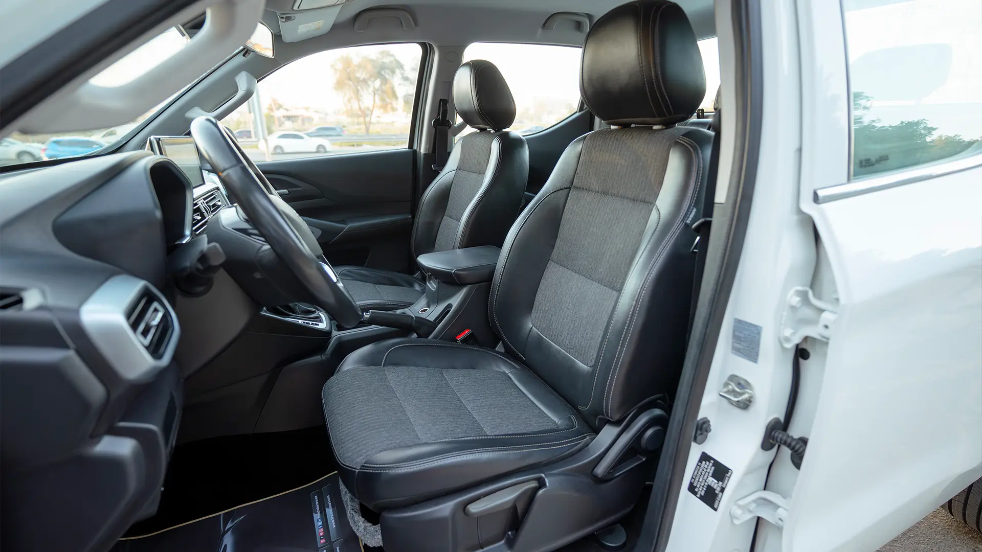 Used 2023 Peugeot Landtrek Double Cabin in White – Front Driver Side Cabin View for Sale at First Choice Cars Dubai Sharjah
