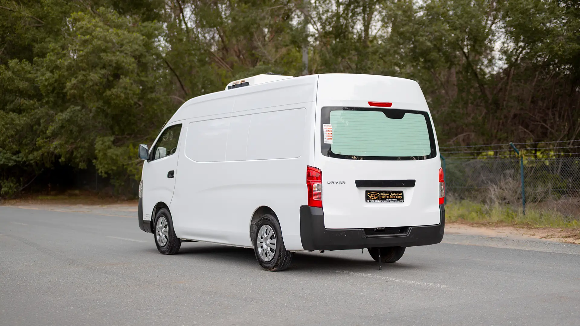 Used 2022 Nissan Urvan High Roof in White – Left Back Diagonal (45°) View for Sale at First Choice Cars Dubai Sharjah