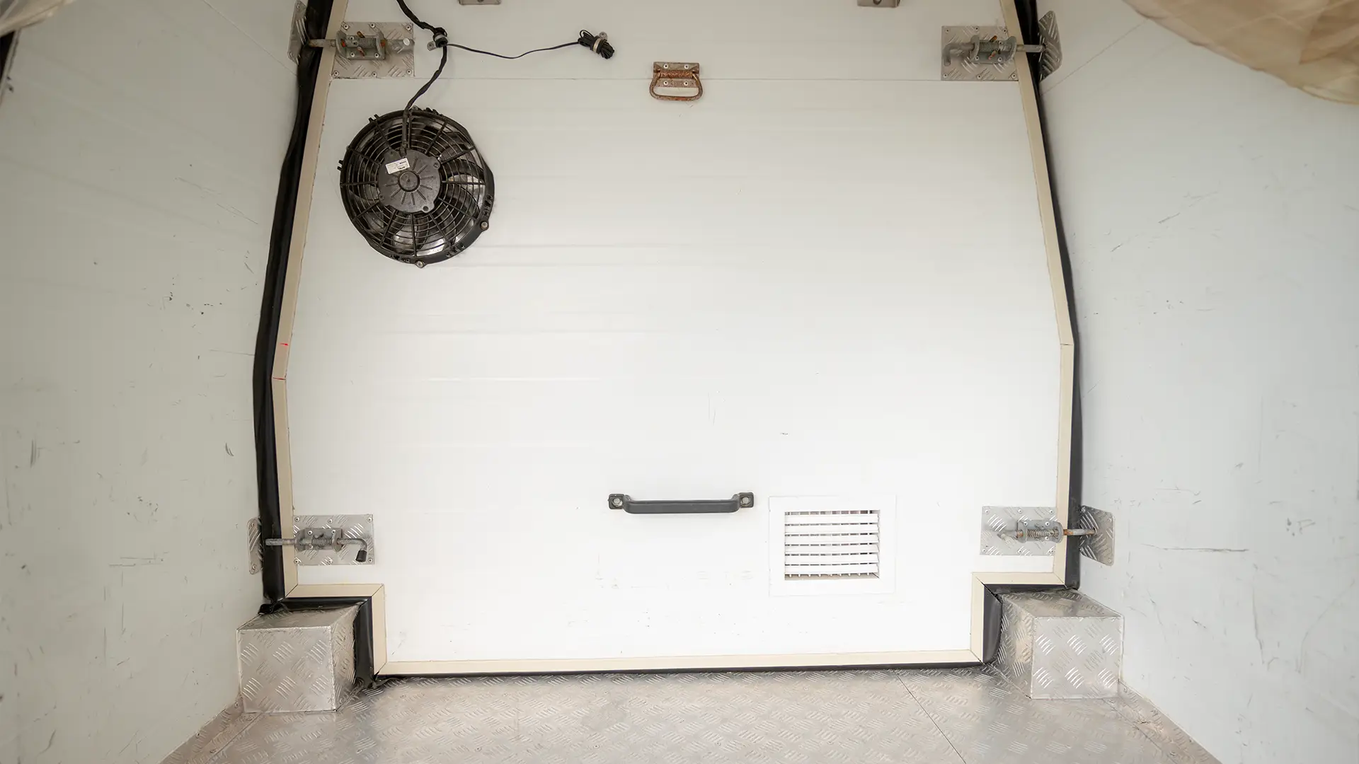 Used 2022 Nissan Urvan High Roof in White – Freezer Box Rear Opening View for Sale at First Choice Cars Dubai Sharjah