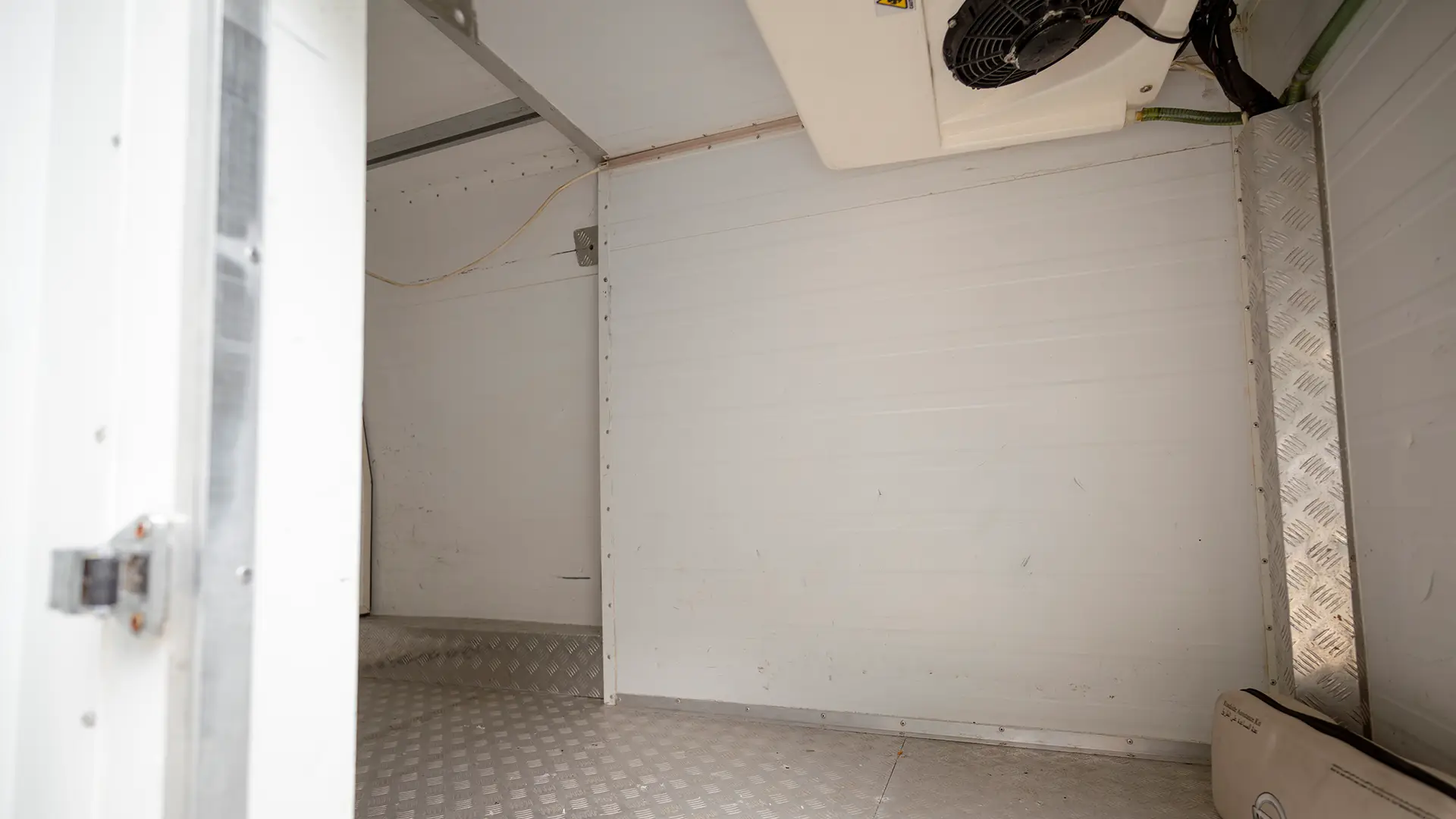 Used 2022 Nissan Urvan High Roof in White – Freezer Box Right Side Interior View for Sale at First Choice Cars Dubai Sharjah