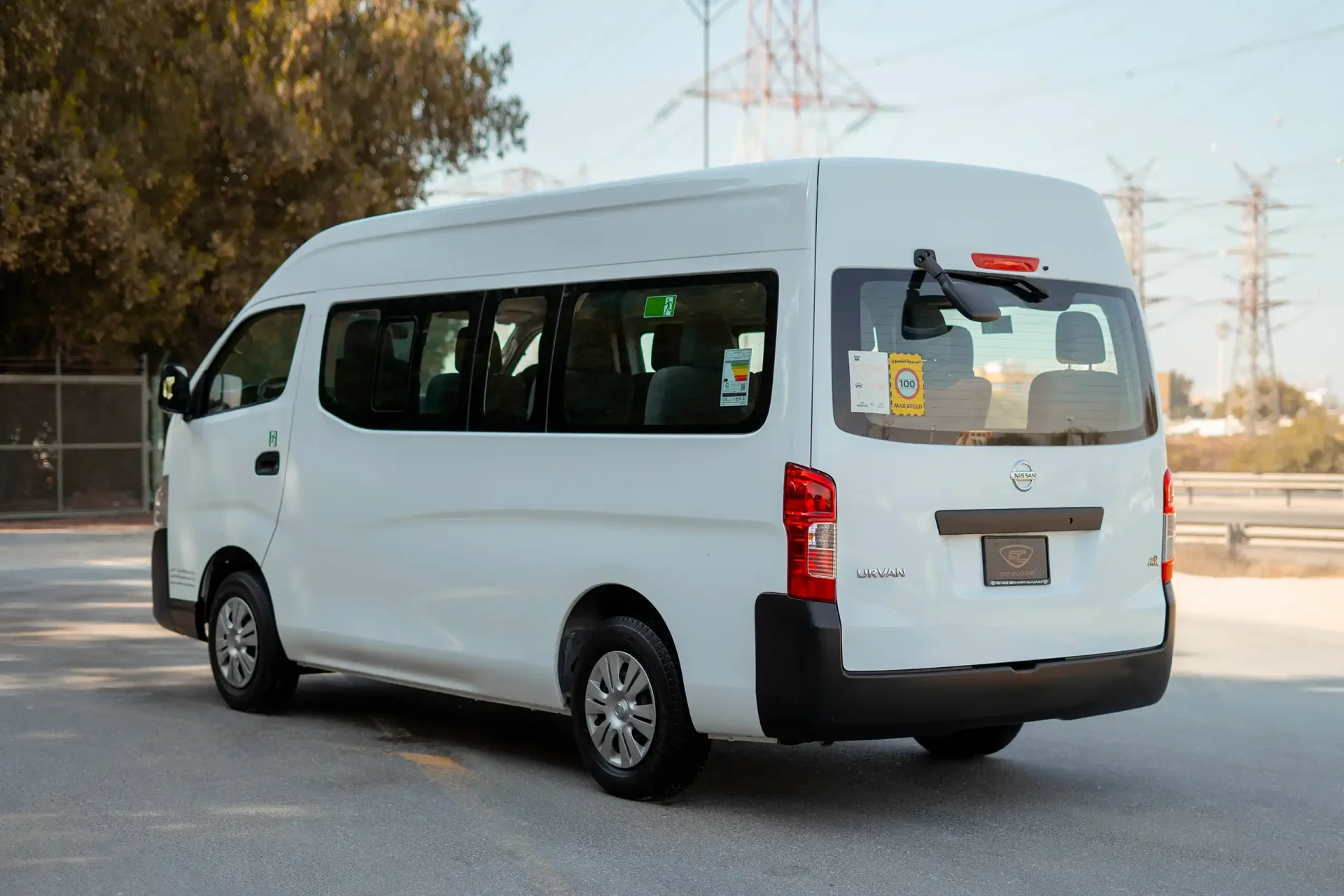 Used 2019 Nissan Urvan High Roof in White – Left Back Diagonal (45°) View for Sale at First Choice Cars Dubai Sharjah