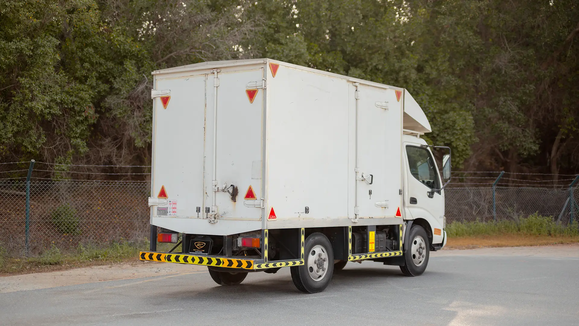 Used 2019 Hino 300 Dry Box in White – Right Back Diagonal (45°) View for Sale at First Choice Cars Dubai Sharjah