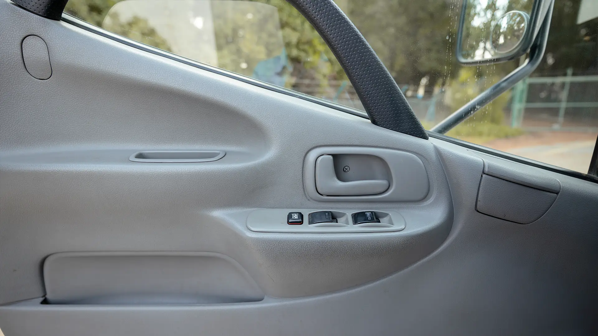 Used 2019 Hino 300 Dry Box in White – Driver Door Panel Full View for Sale at First Choice Cars Dubai Sharjah