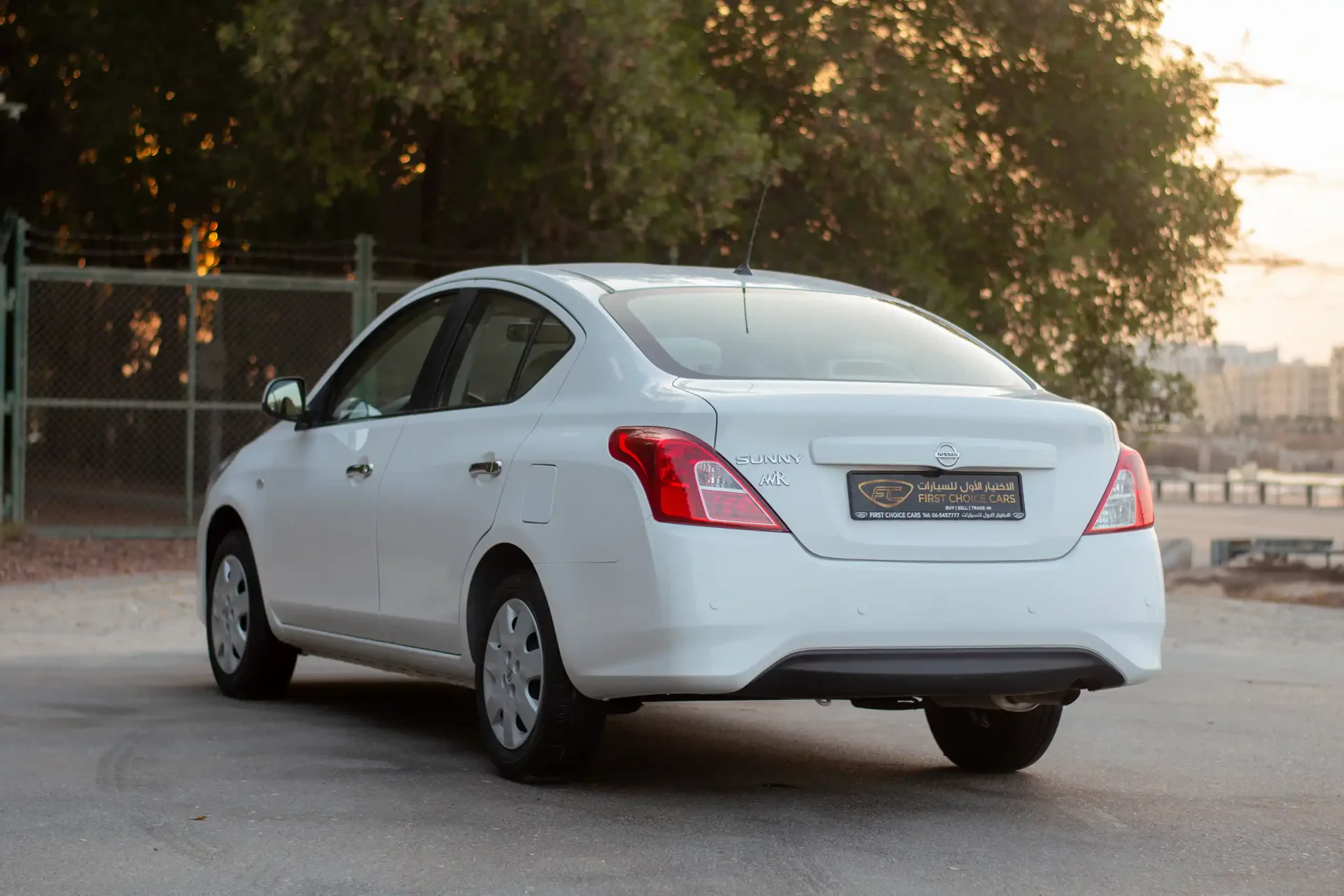 Used 2023 Nissan Sunny SV in White – Left Back Diagonal (45°) View for Sale at First Choice Cars Dubai Sharjah