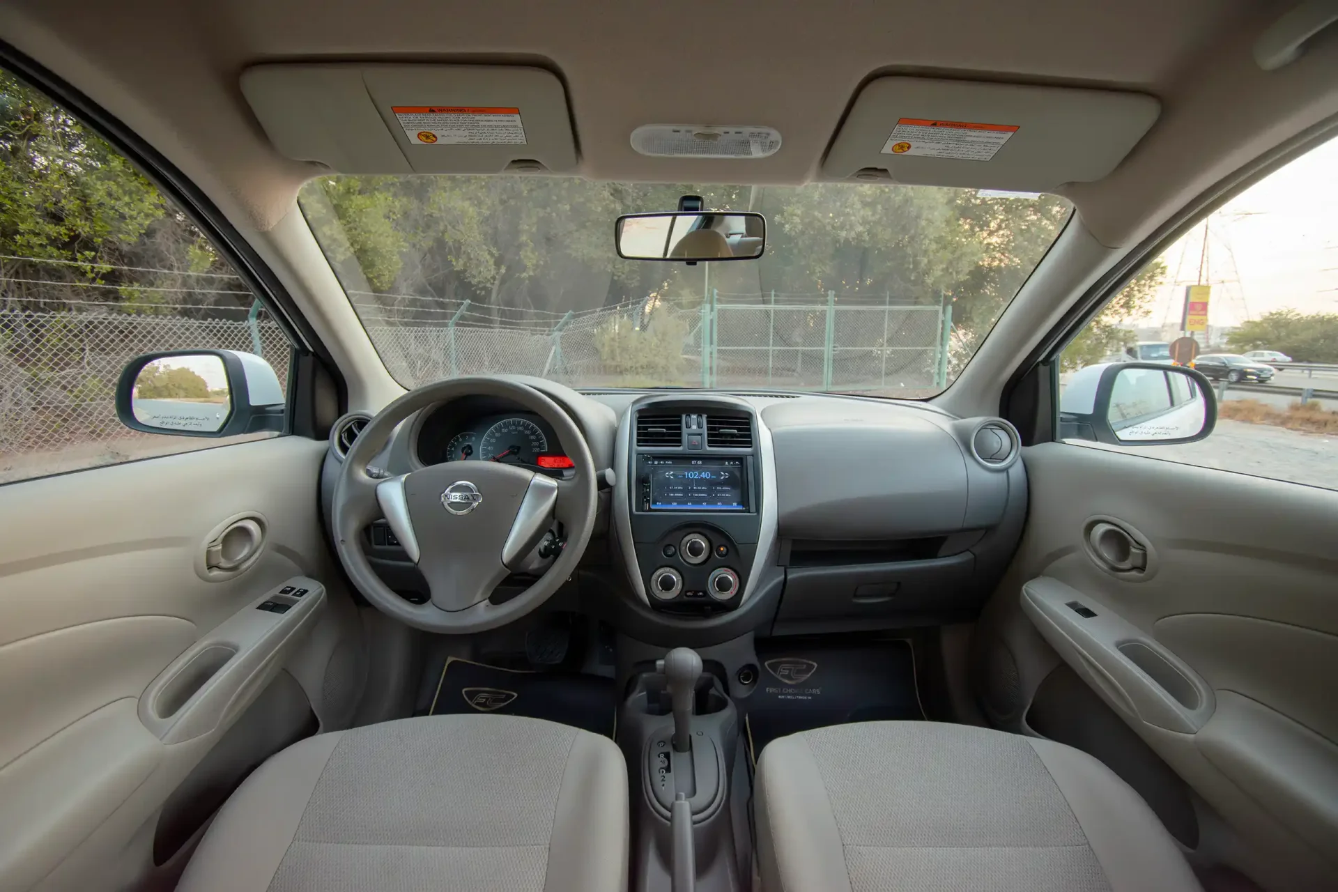 Used 2023 Nissan Sunny SV in White – Front Cabin / Dashboard Full View for Sale at First Choice Cars Dubai Sharjah