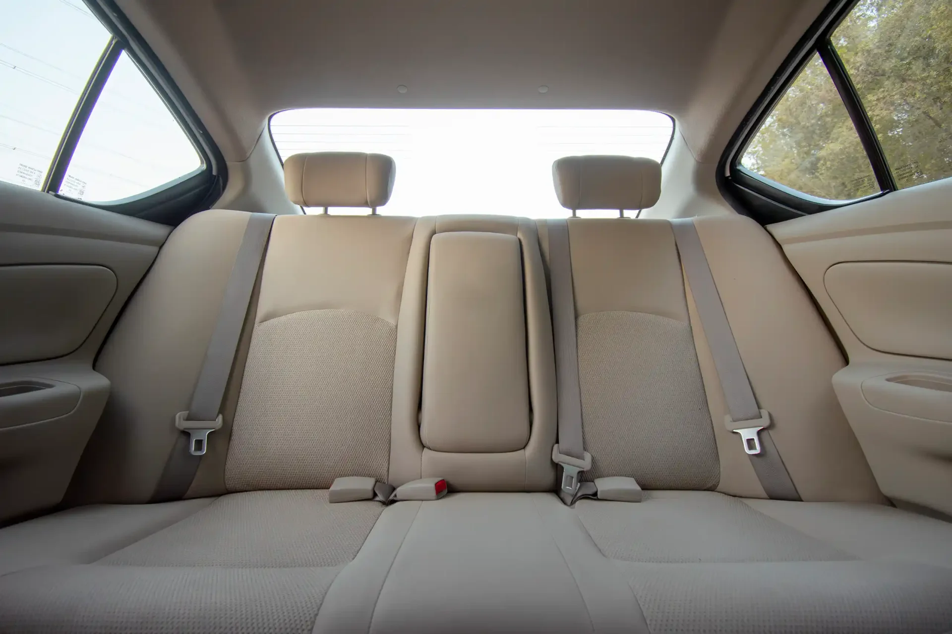 Used 2023 Nissan Sunny SV in White – Rear Seat View for Sale at First Choice Cars Dubai Sharjah