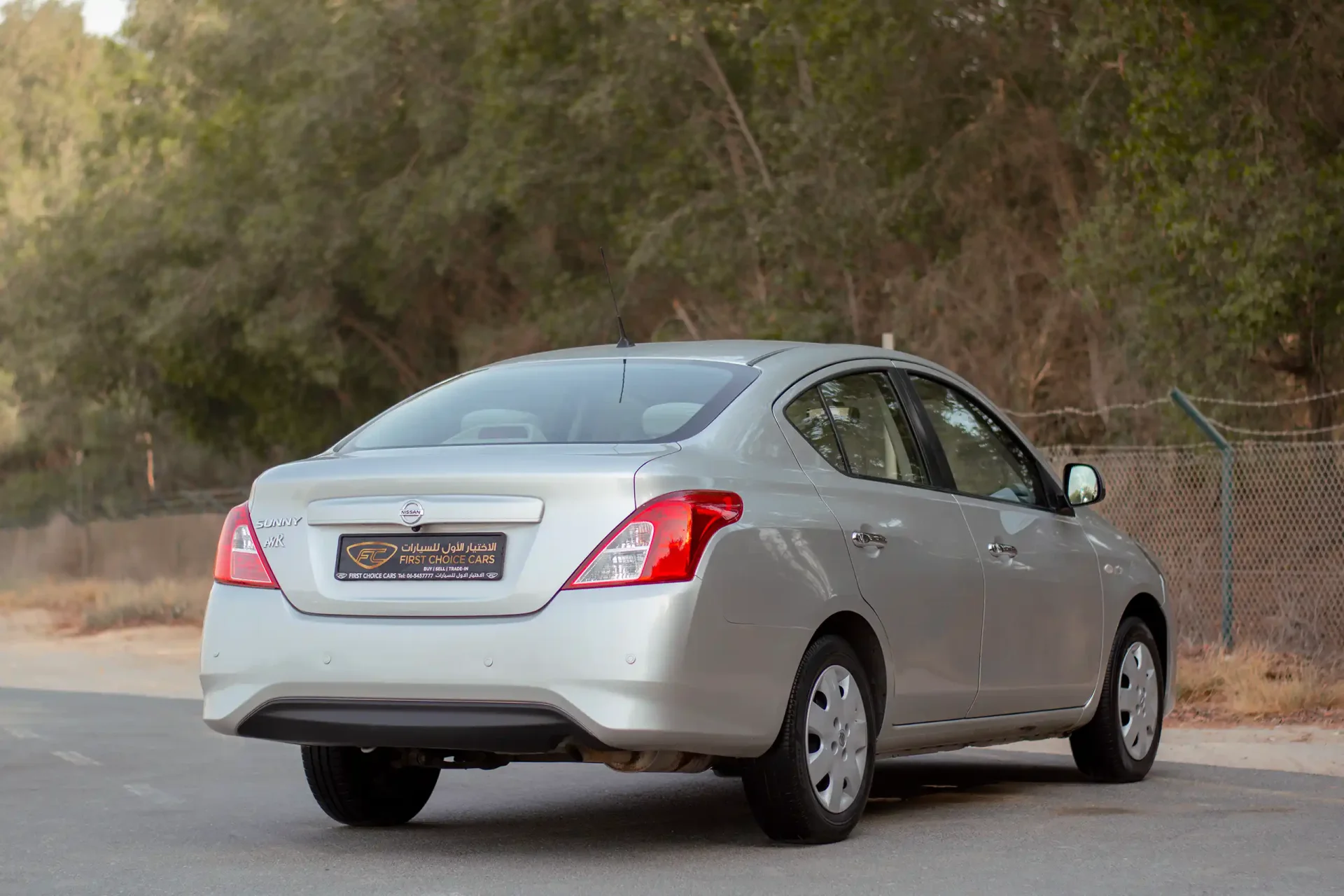 Used 2022 Nissan Sunny SV in Silver – Right Back Diagonal (45°) View for Sale at First Choice Cars Dubai Sharjah