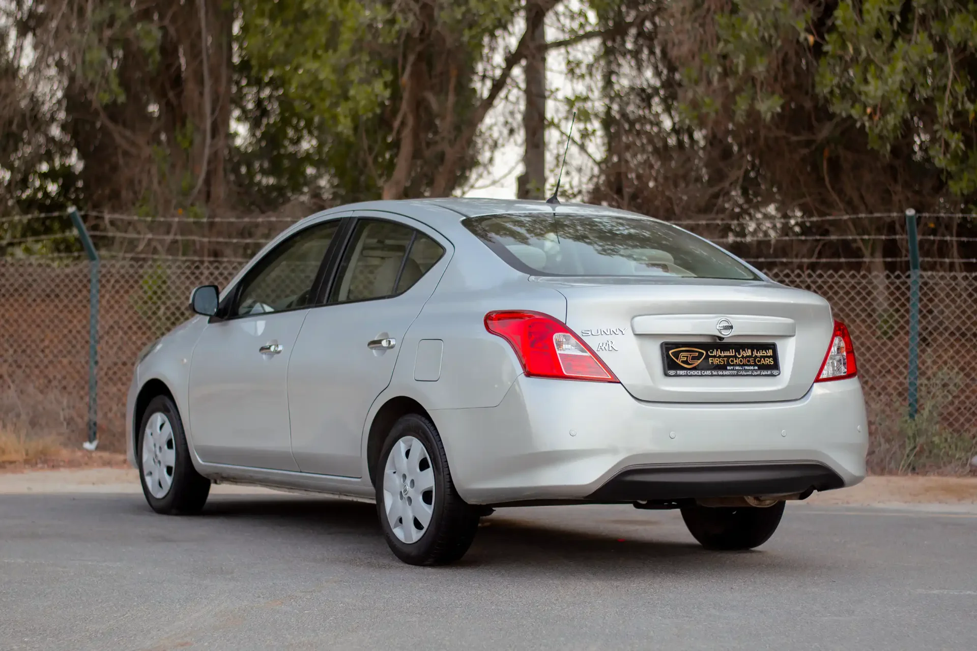 Used 2022 Nissan Sunny SV in Silver – Left Back Diagonal (45°) View for Sale at First Choice Cars Dubai Sharjah