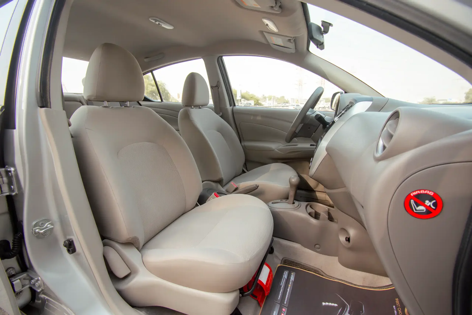Used 2022 Nissan Sunny SV in Silver – Front Passenger Side Cabin View for Sale at First Choice Cars Dubai Sharjah