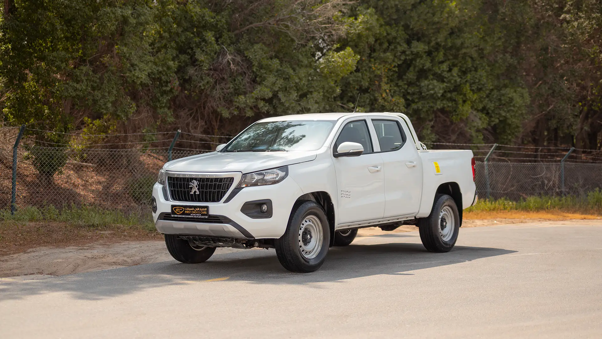 Used 2023 Peugeot Landtrek Double Cabin in White – Left Front Diagonal (45°) View for Sale at First Choice Cars Dubai Sharjah