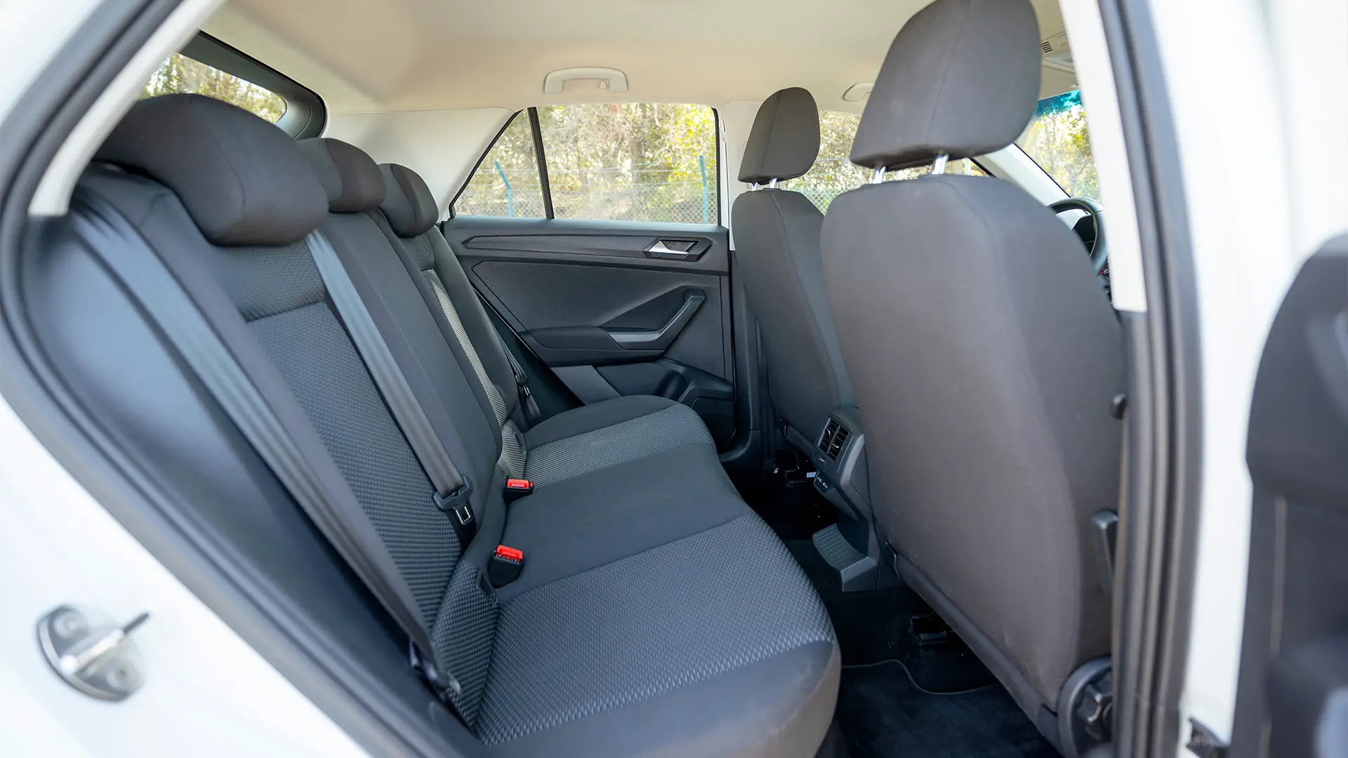 Used 2021 Volkswagen T-Roc Trend in White – Rear Passenger Side Cabin View for Sale at First Choice Cars Dubai Sharjah