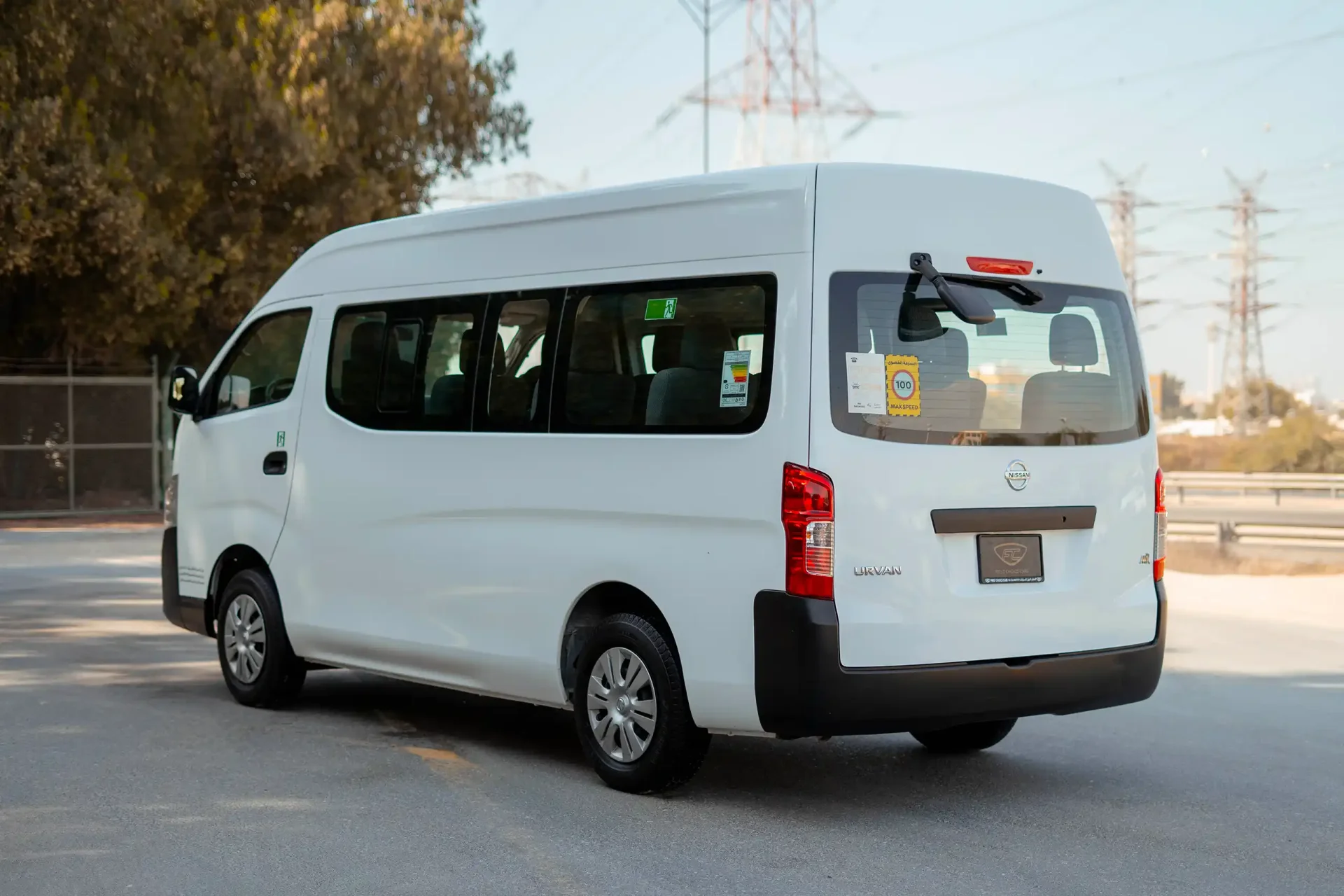 Used 2021 Nissan Urvan High Roof in White – Left Back Diagonal (45°) View for Sale at First Choice Cars Dubai Sharjah