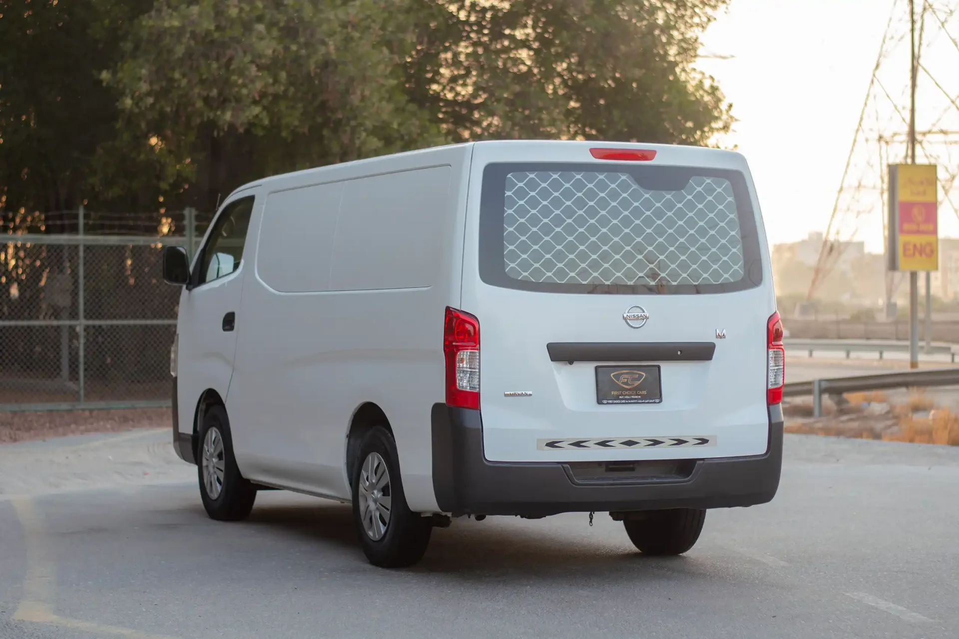 Used 2022 Nissan Urvan Standard Roof in White – Left Back Diagonal (45°) View for Sale at First Choice Cars Dubai Sharjah