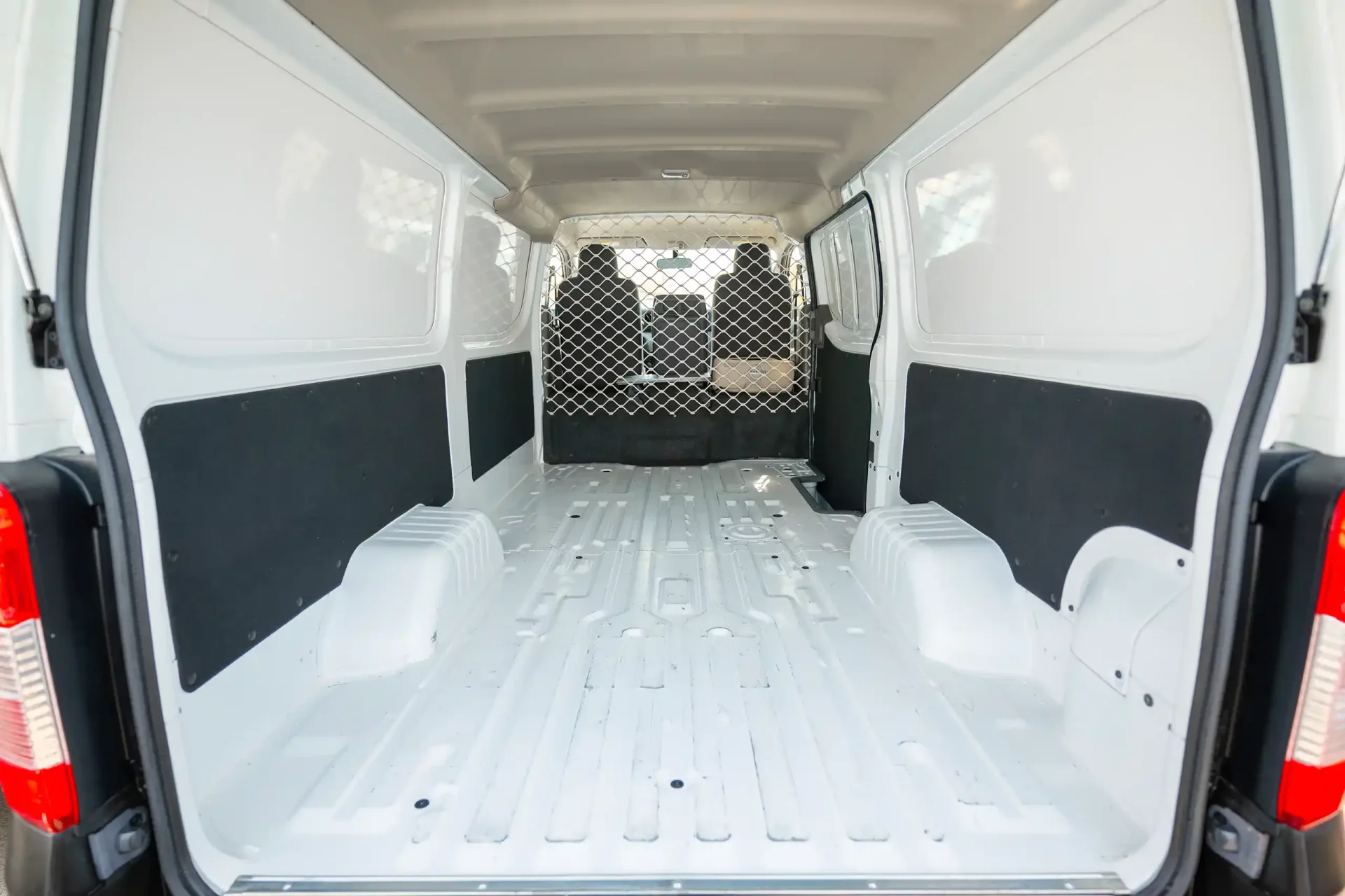 Used 2022 Nissan Urvan Standard Roof in White – Delivery Box Rear Opening View for Sale at First Choice Cars Dubai Sharjah