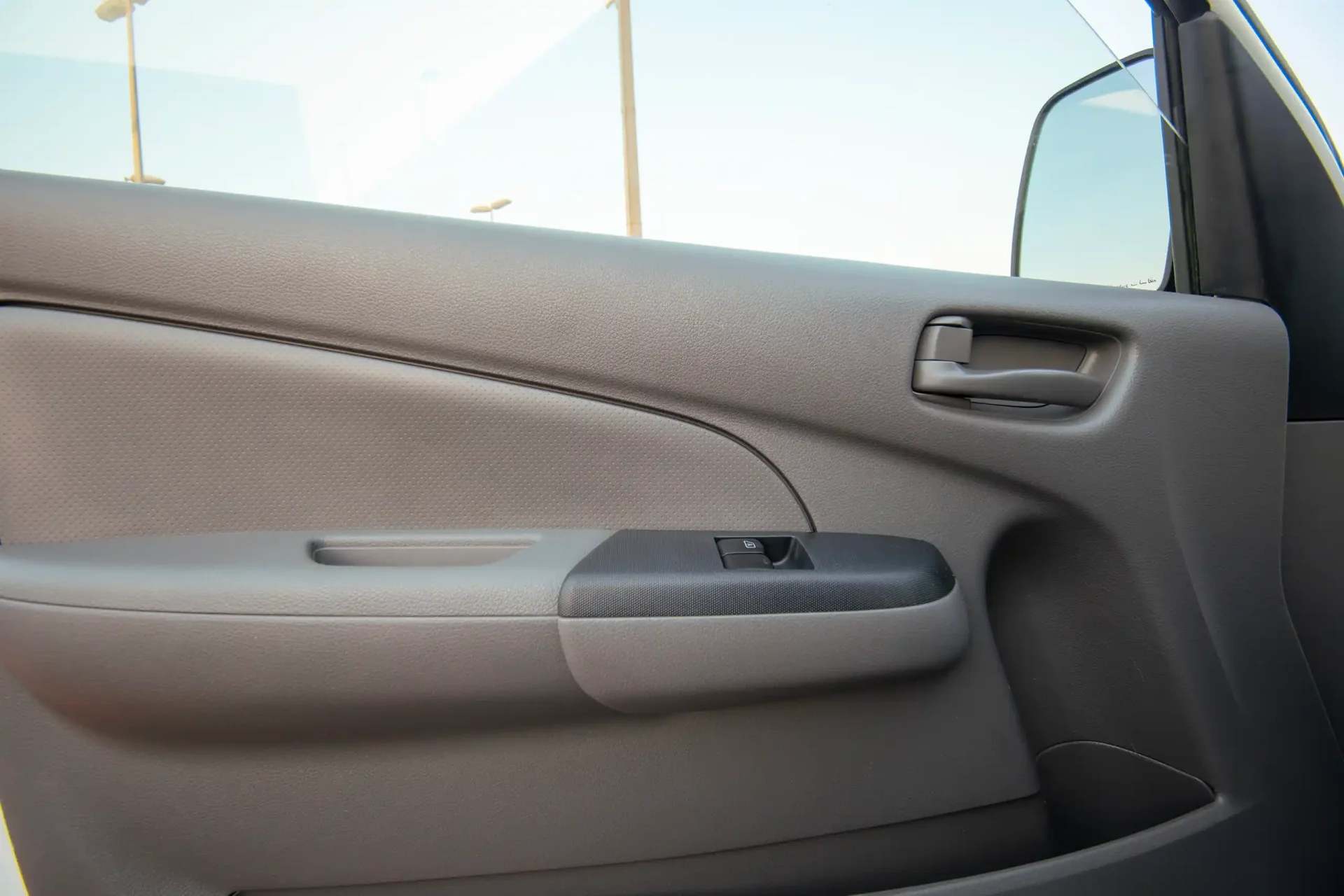 Used 2022 Nissan Urvan Standard Roof in White – Driver Door Panel Full View for Sale at First Choice Cars Dubai Sharjah