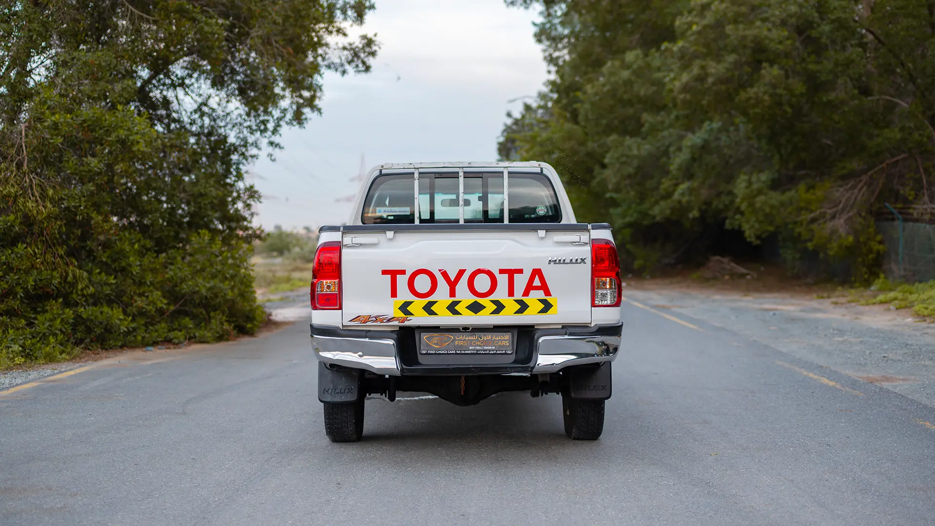 Used 2021 Toyota Hilux DLX Double Cabin in White – Back/Rear View for Sale at First Choice Cars Dubai Sharjah