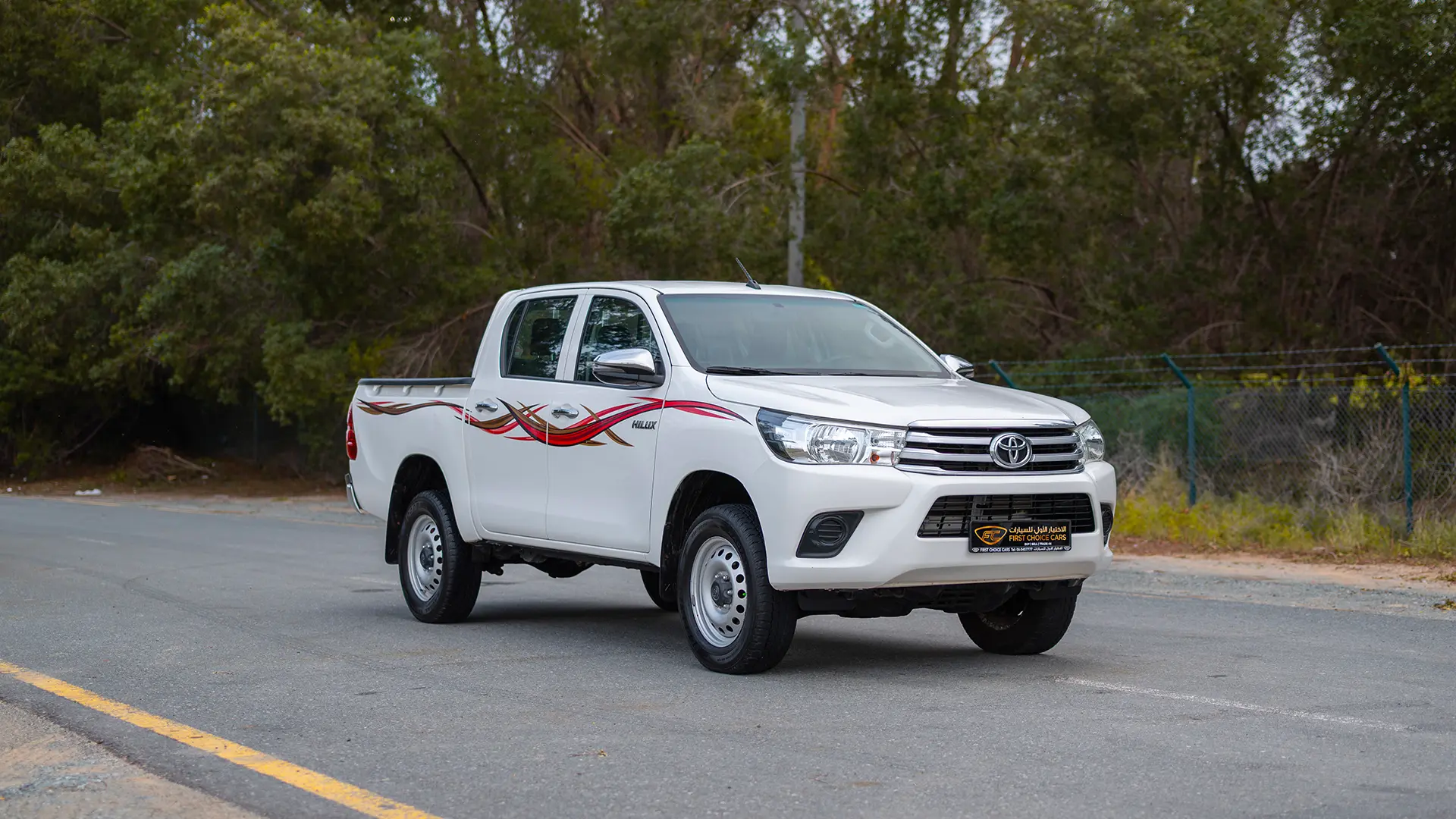 Used 2021 Toyota Hilux GLX Double Cabin in White – Right Front Diagonal (45°) View for Sale at First Choice Cars Dubai Sharjah