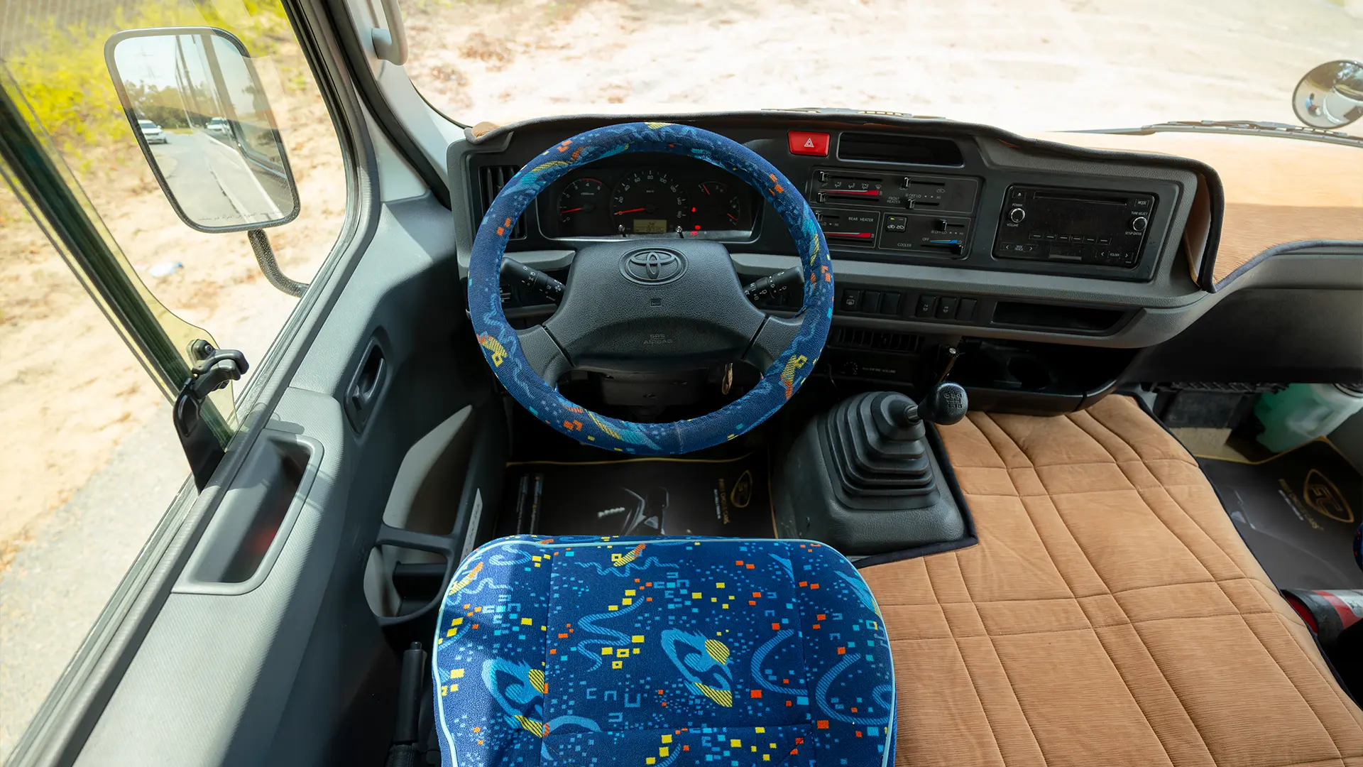 Used 2022 Toyota Coaster High Roof in White – Steering Wheel & Instrument Cluster for Sale at First Choice Cars Dubai Sharjah