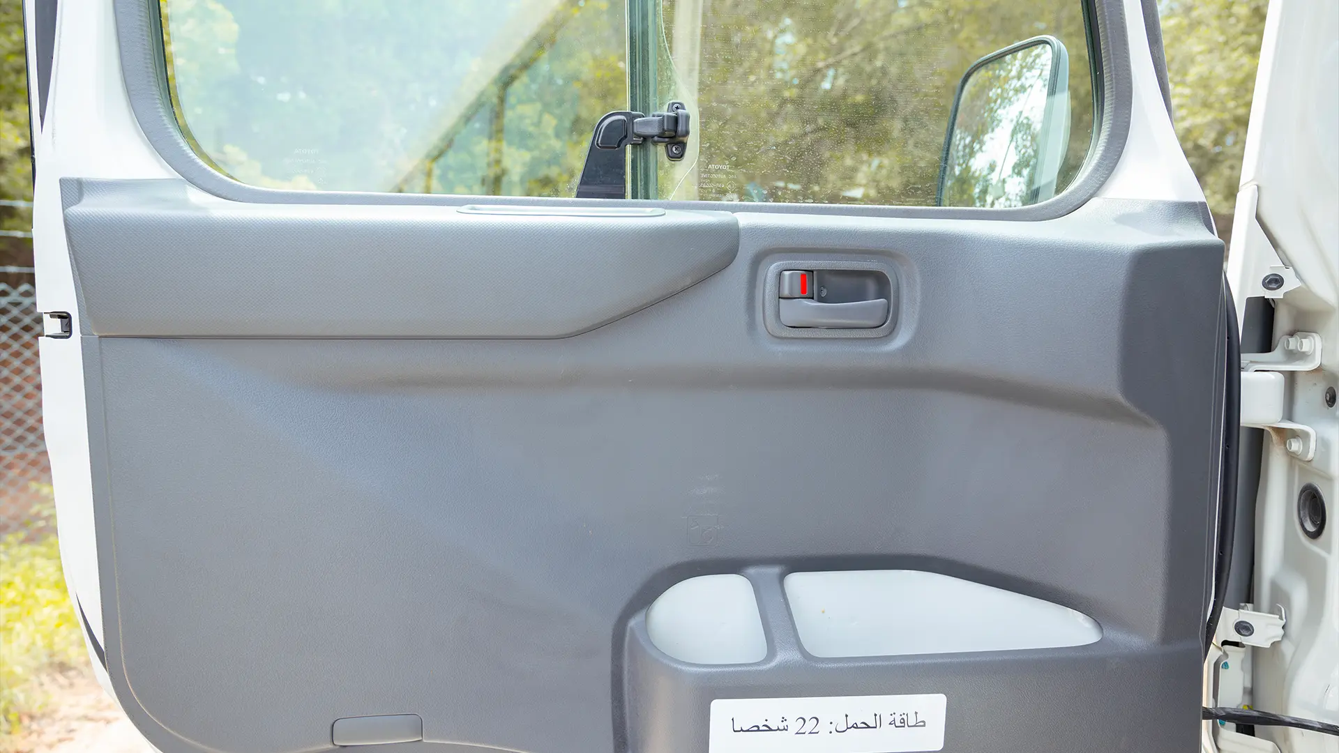 Used 2022 Toyota Coaster High Roof in White – Driver Door Panel Full View for Sale at First Choice Cars Dubai Sharjah