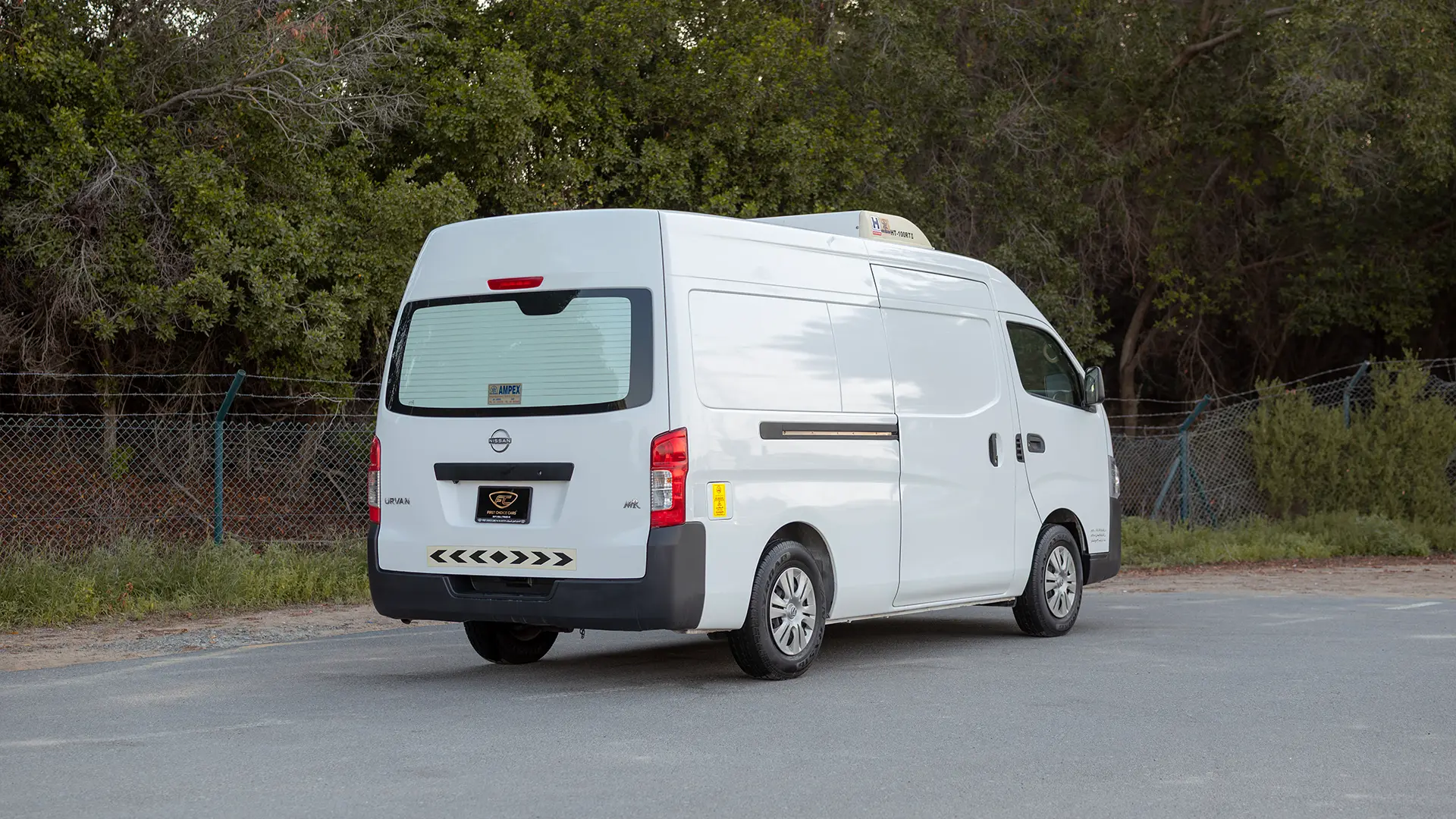 Used 2023 Nissan Urvan High Roof in White – Right Back Diagonal (45°) View for Sale at First Choice Cars Dubai Sharjah