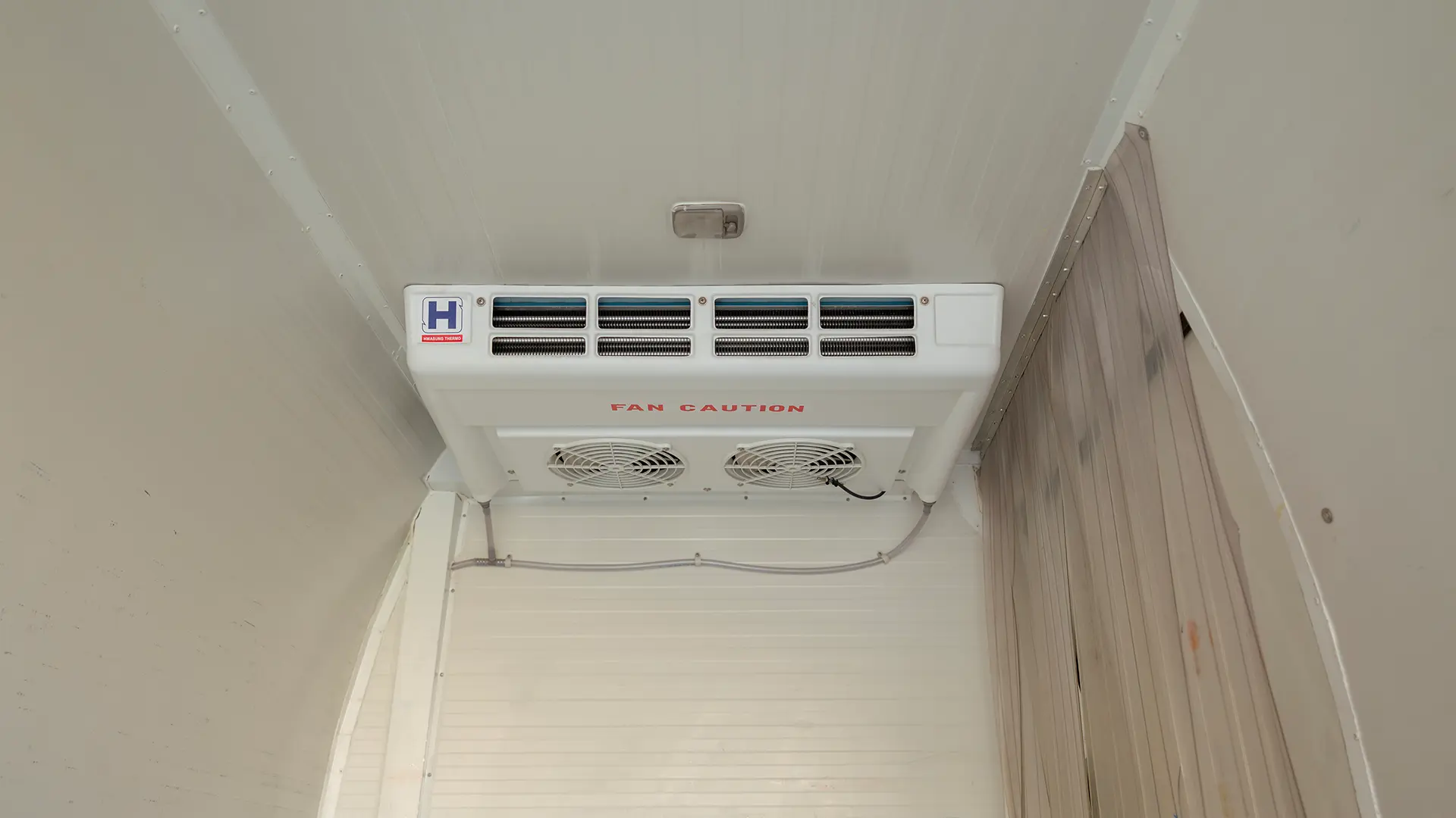 Used 2023 Nissan Urvan High Roof in White – Chiller Cooling Unit View for Sale at First Choice Cars Dubai Sharjah