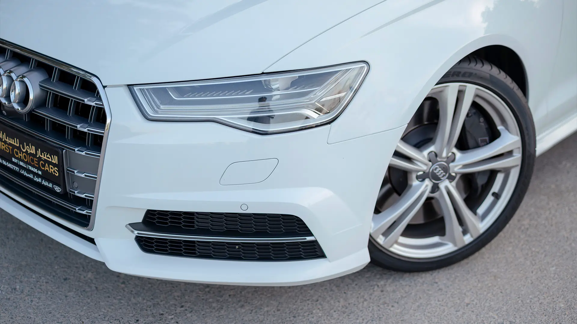 Used 2016 Audi S6 TFSI Quattro in White – Headlight Close-up for Sale at First Choice Cars Dubai Sharjah