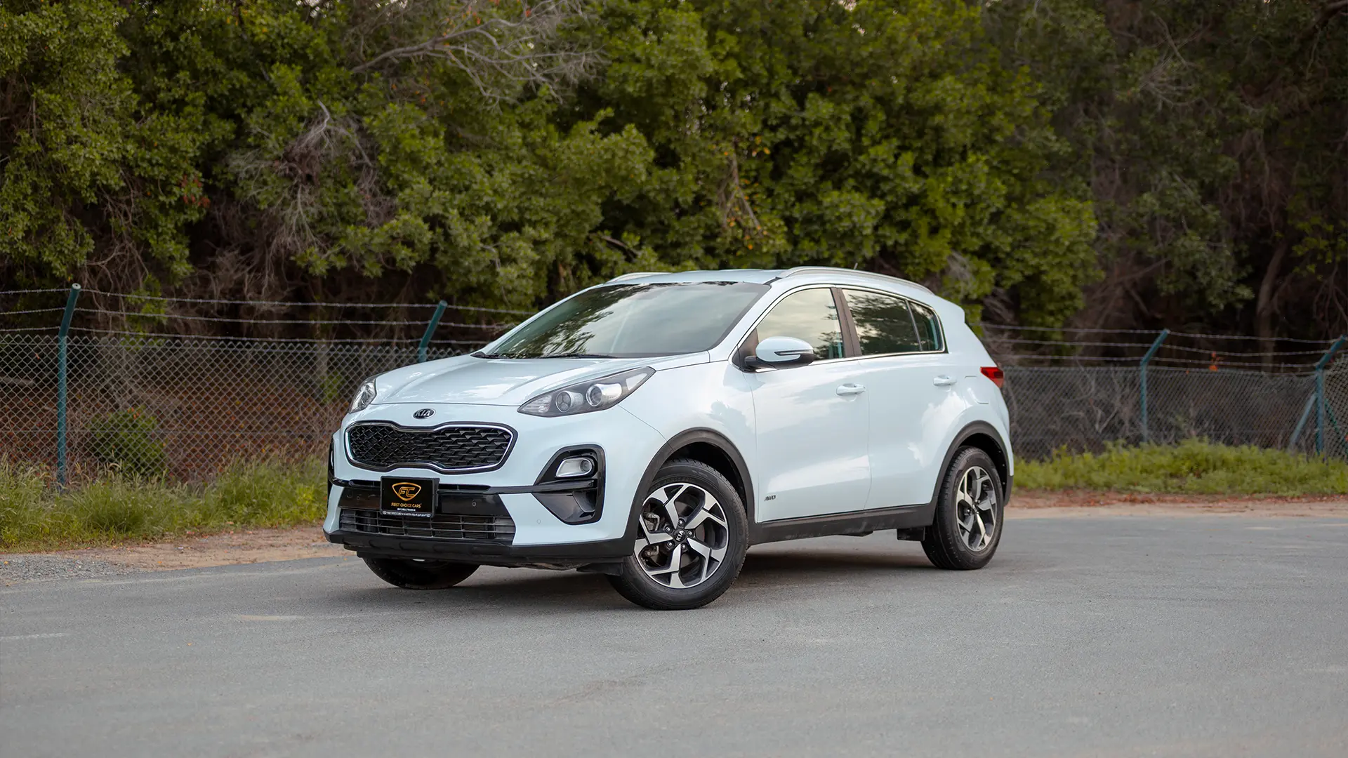 Used 2020 Kia Sportage LX in White – Left Front Diagonal (45°) View for Sale at First Choice Cars Dubai Sharjah