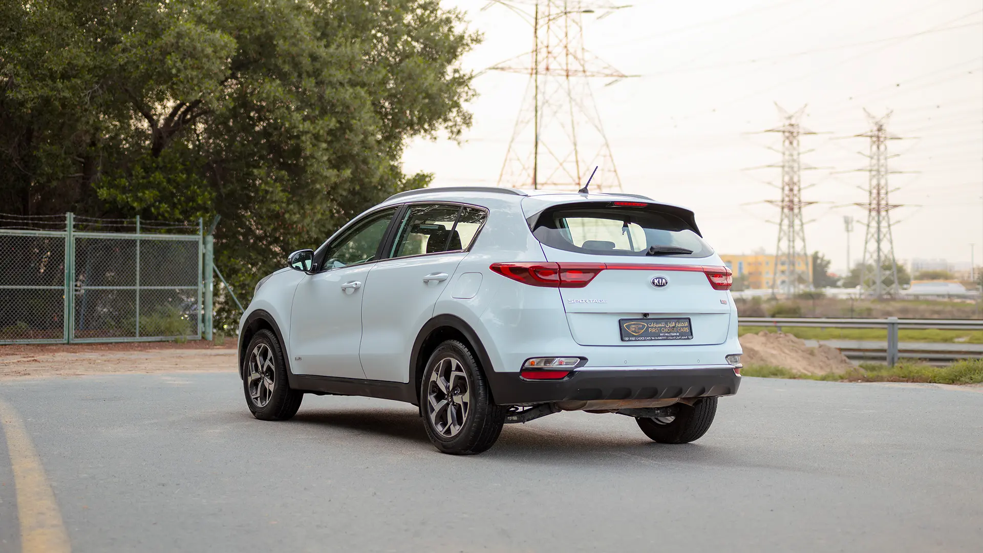 Used 2020 Kia Sportage LX in White – Left Back Diagonal (45°) View for Sale at First Choice Cars Dubai Sharjah