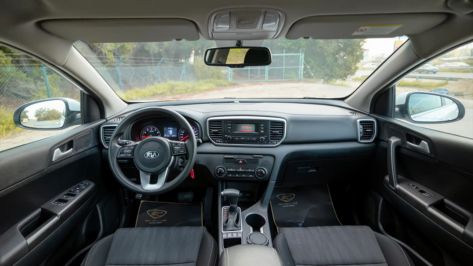 Used 2020 Kia Sportage LX in White – Front Cabin / Dashboard Full View for Sale at First Choice Cars Dubai Sharjah