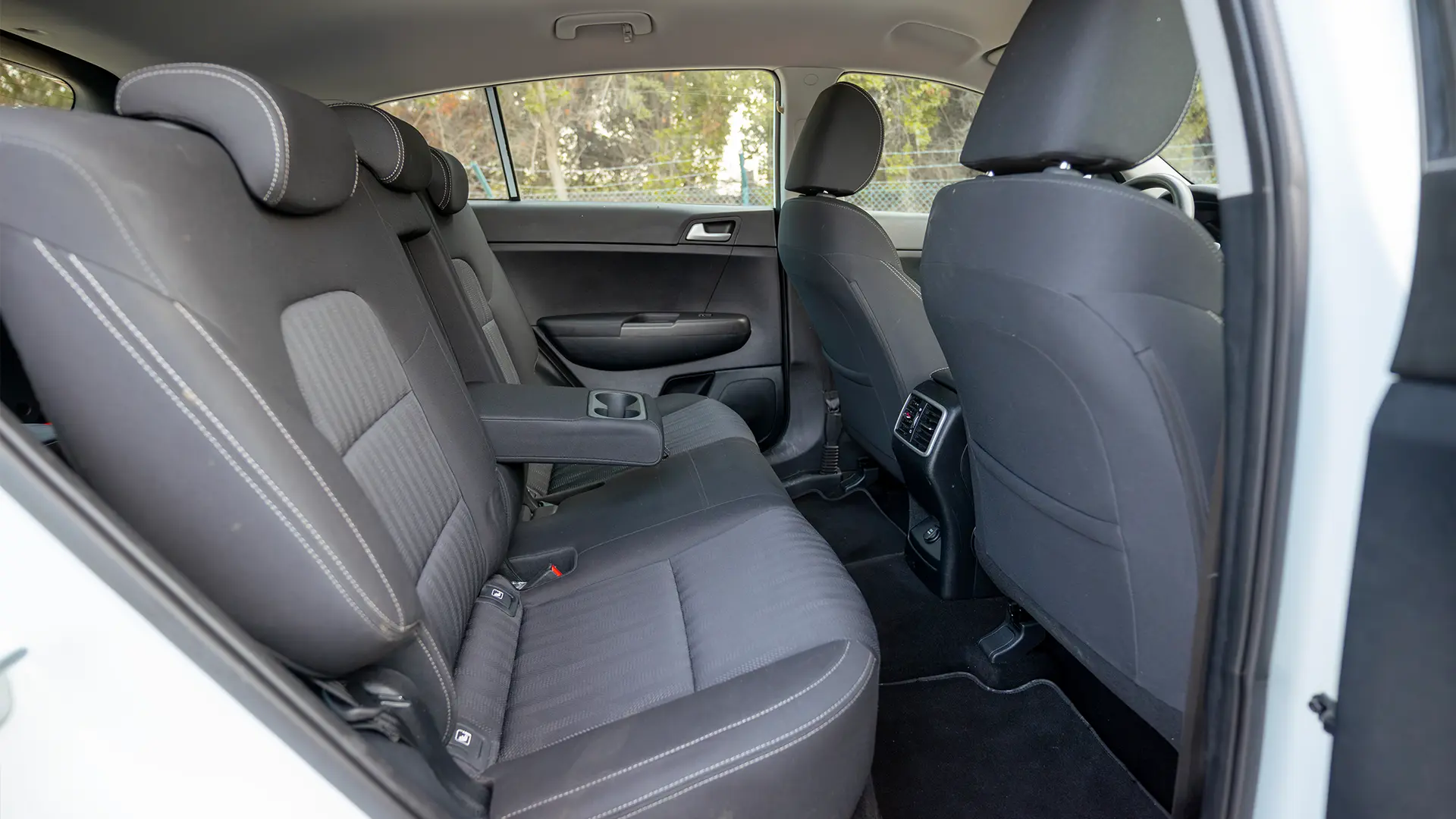 Used 2020 Kia Sportage LX in White – Rear Passenger Side Cabin View for Sale at First Choice Cars Dubai Sharjah