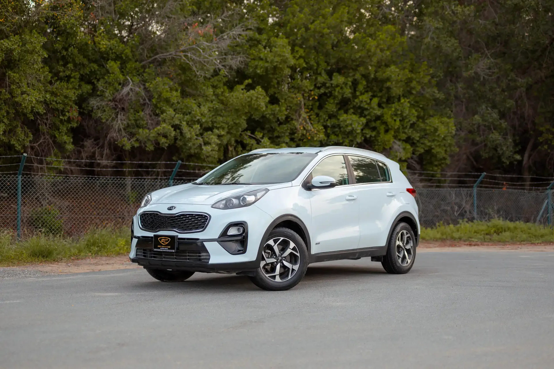 Used 2019 Kia Sportage LX in White – Left Front Diagonal (45°) View for Sale at First Choice Cars Dubai Sharjah