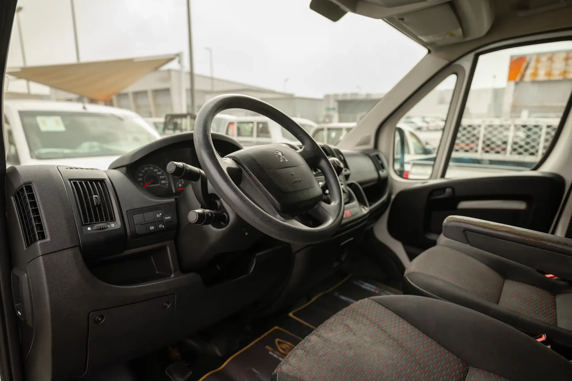Used 2022 Peugeot Boxer L2h2 in White – Driver Side Dashboard & Steering View for Sale at First Choice Cars Dubai Sharjah
