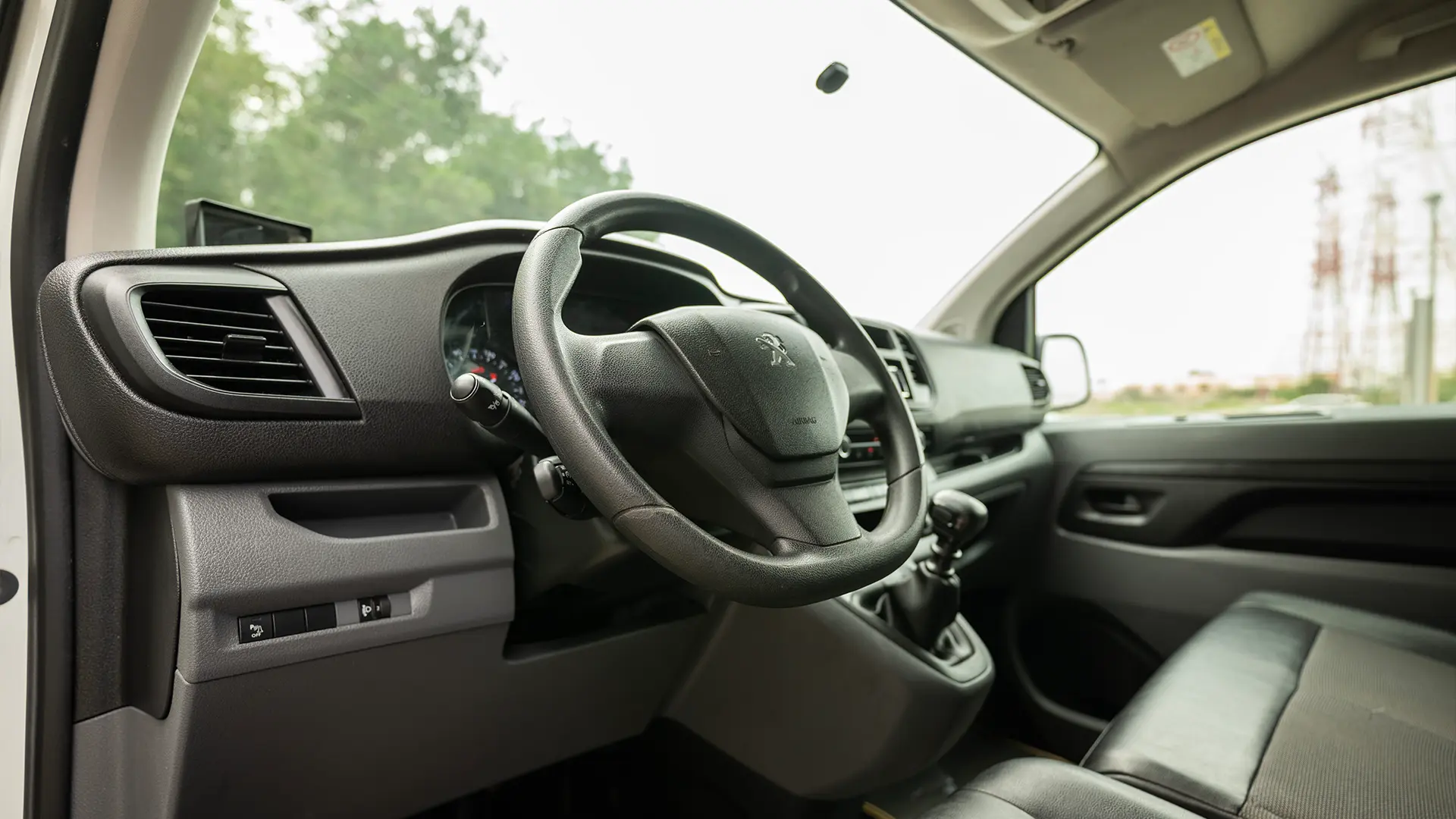 Used 2020 Peugeot Expert L3 in Yellow – Driver Side Dashboard & Steering View for Sale at First Choice Cars Dubai Sharjah