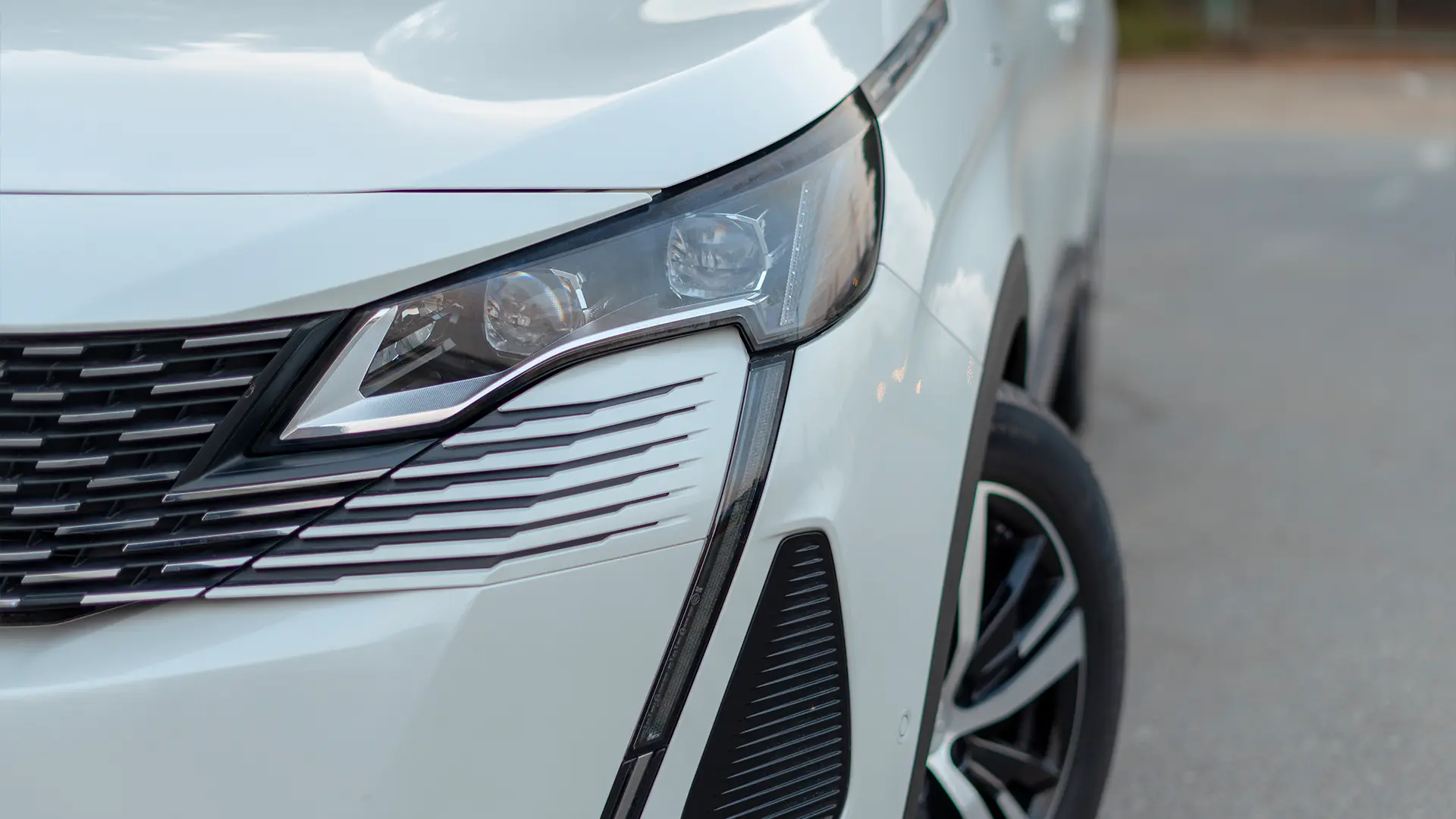 Used 2024 Peugeot 5008 GT Line in White – Headlight Close-up for Sale at First Choice Cars Dubai Sharjah