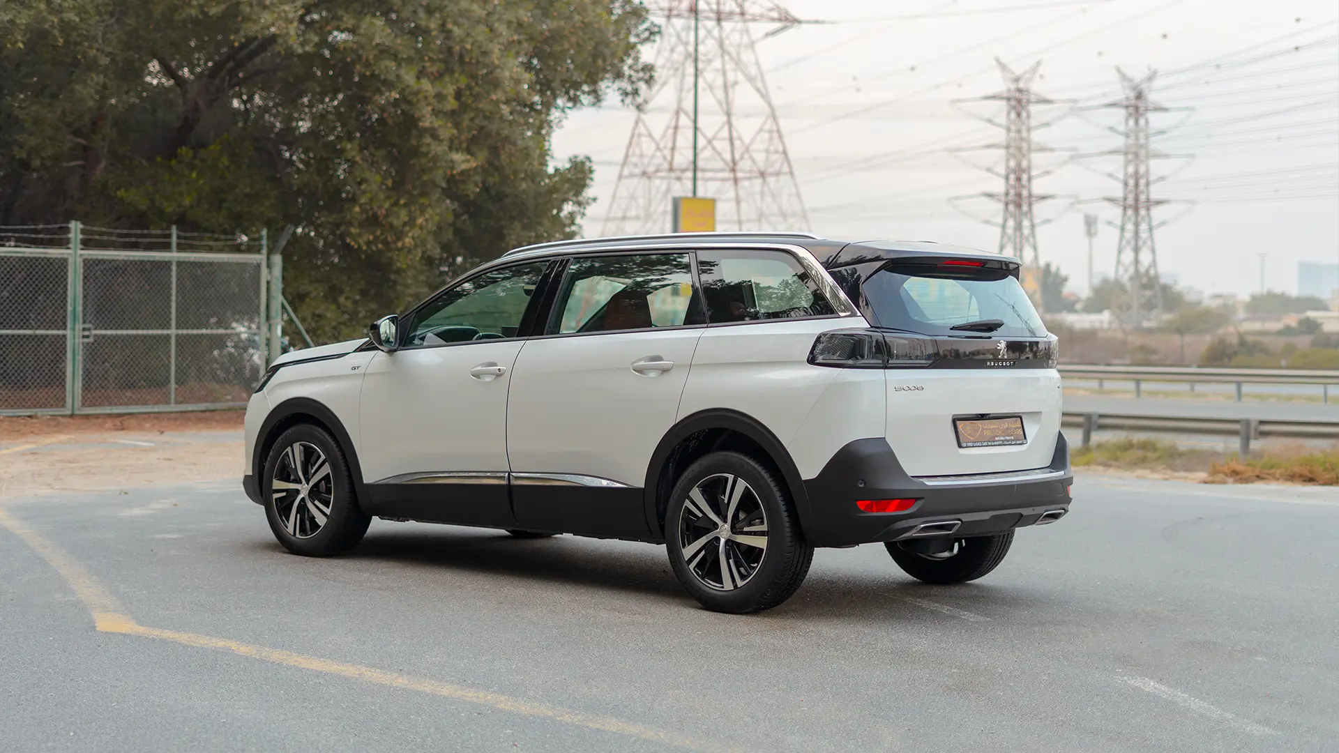 Used 2024 Peugeot 5008 GT Line in White – Left Back Diagonal (45°) View for Sale at First Choice Cars Dubai Sharjah