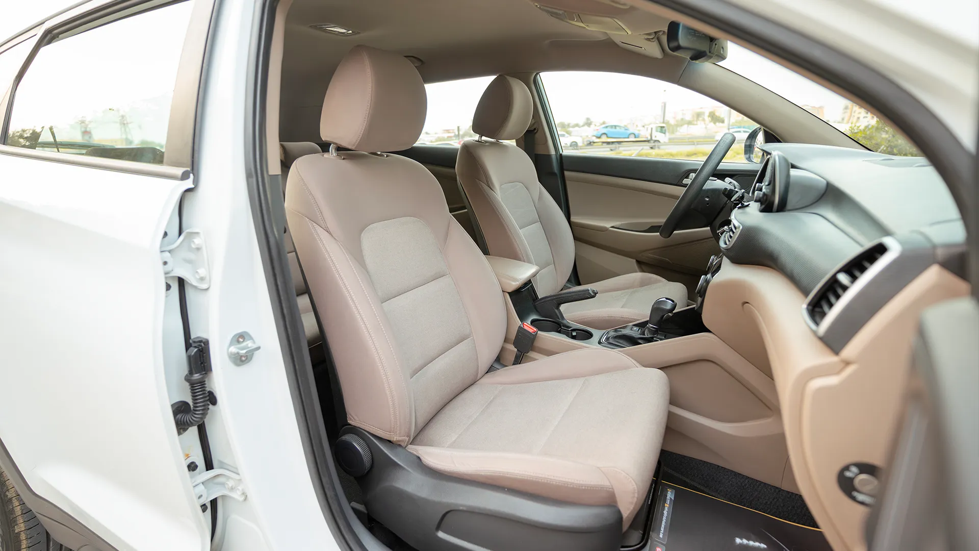 Used 2020 Hyundai Tucson GDI in White – Front Passenger Side Cabin View for Sale at First Choice Cars Dubai Sharjah