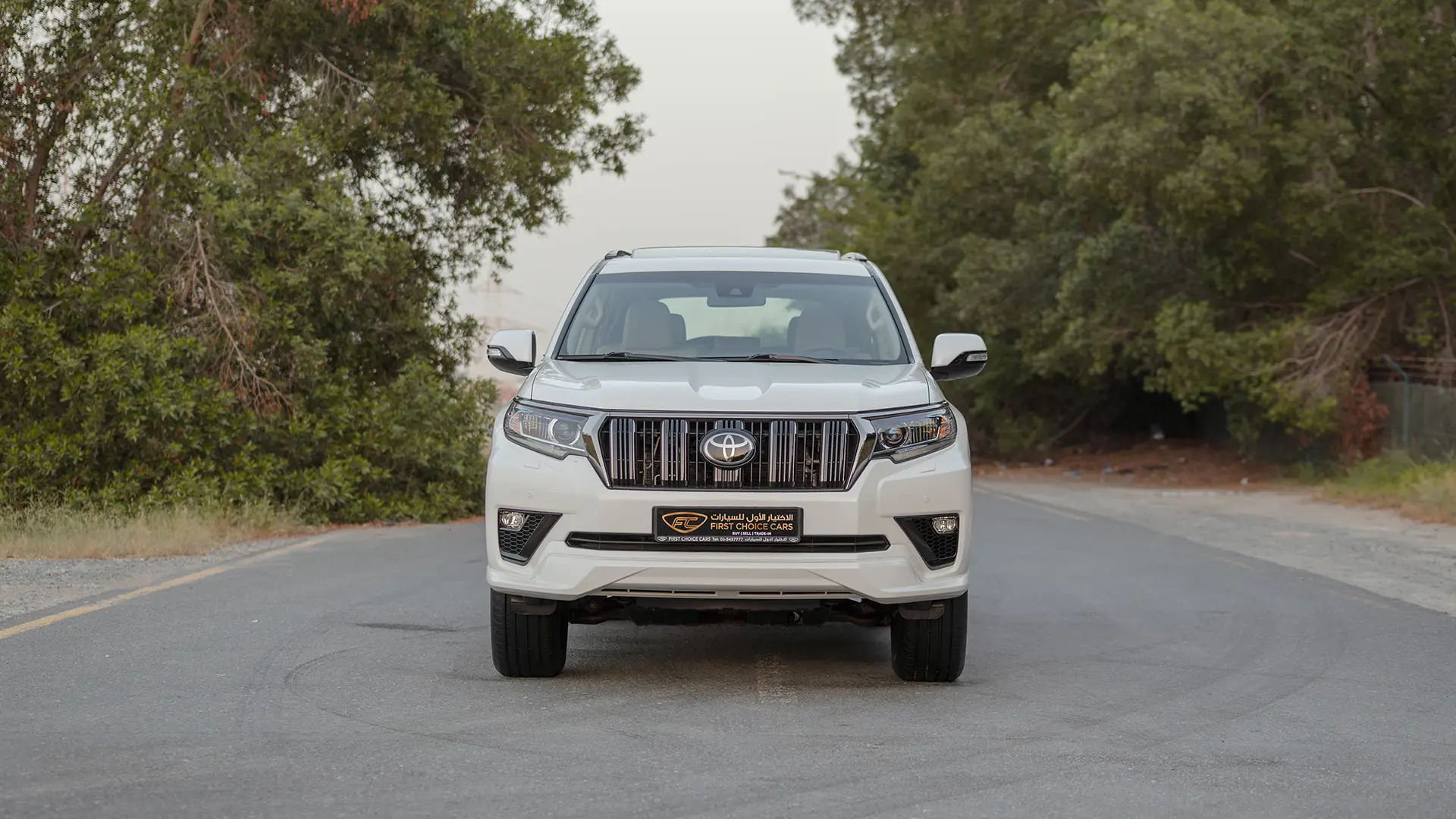 Used 2022 Toyota Prado VXR in White – Front View for Sale at First Choice Cars Dubai Sharjah